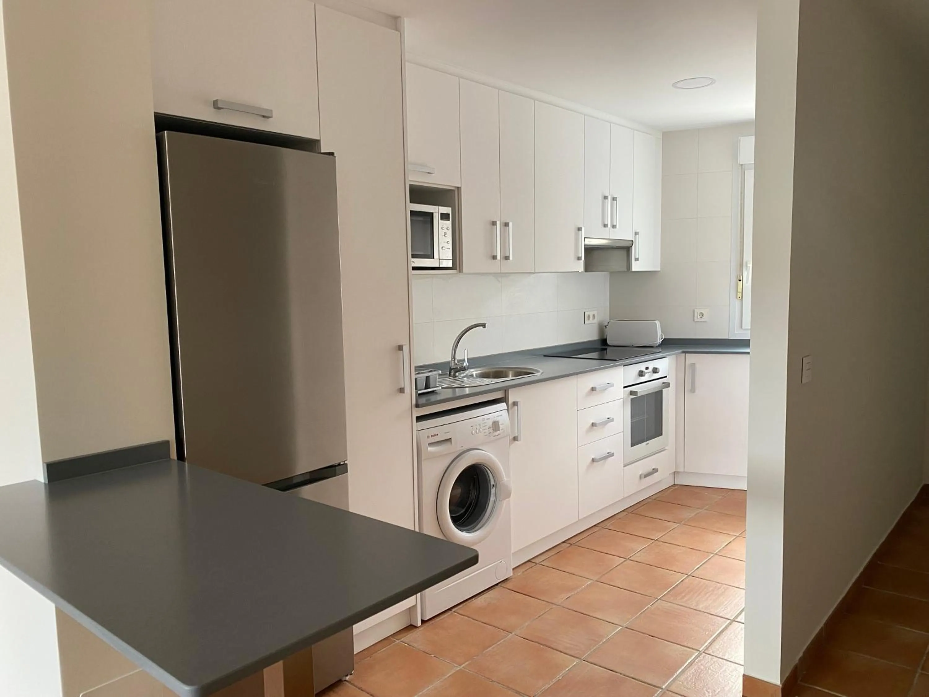 kitchen in Apartahotel Vistamar San José