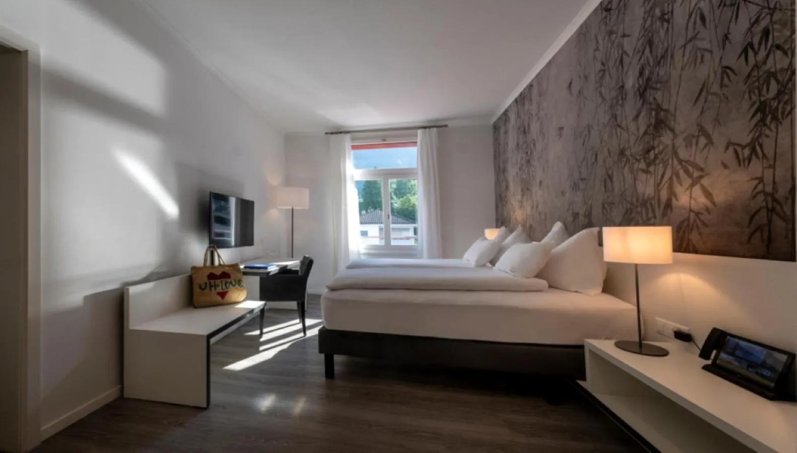 Bed in Hotel Vitznauerhof - Lifestyle Hideaway at Lake Lucerne