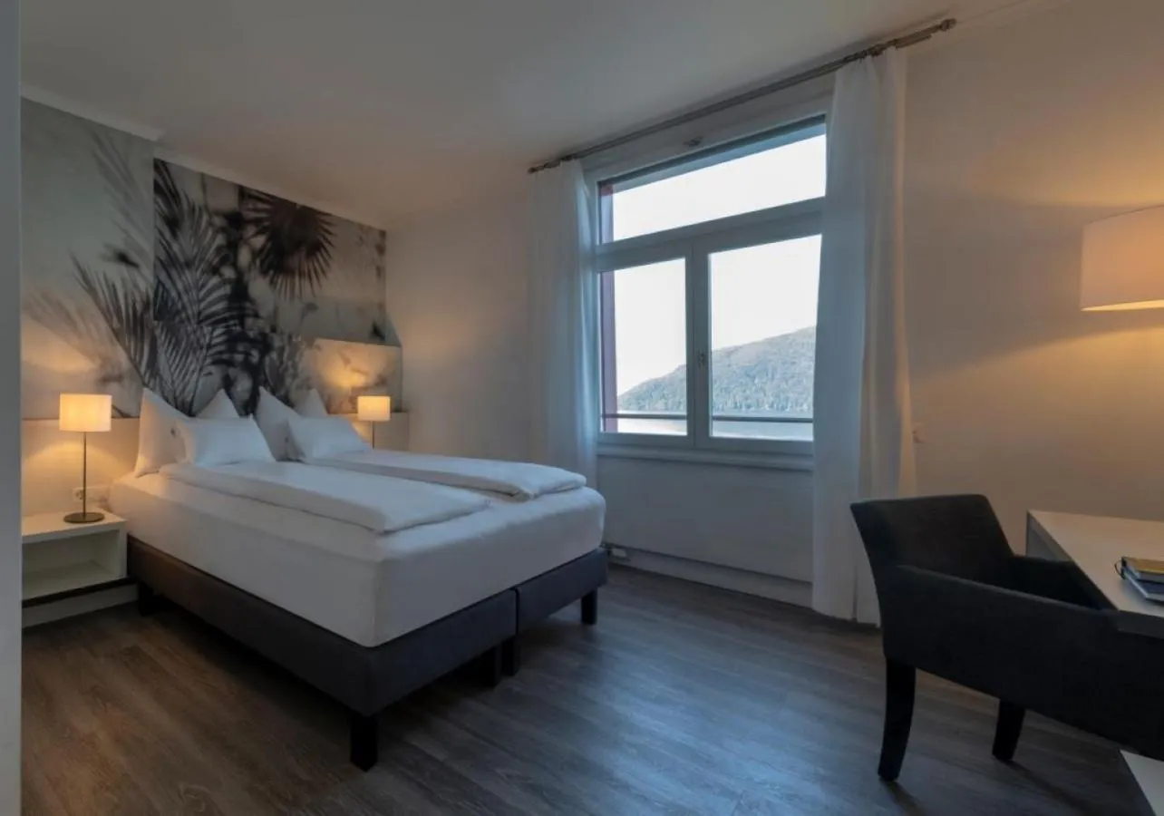 Bed in Hotel Vitznauerhof - Lifestyle Hideaway at Lake Lucerne