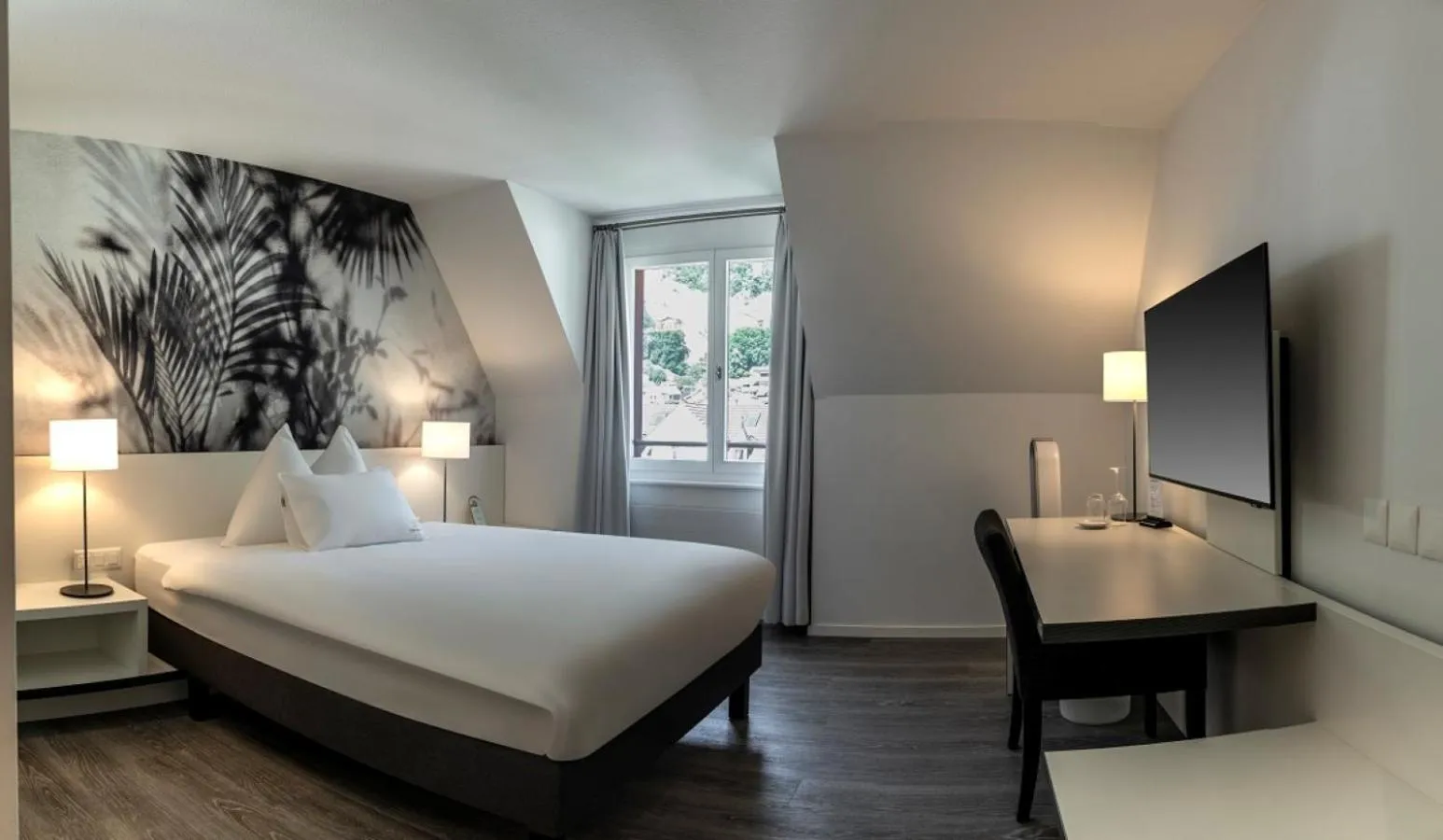 Bed in Hotel Vitznauerhof - Lifestyle Hideaway at Lake Lucerne