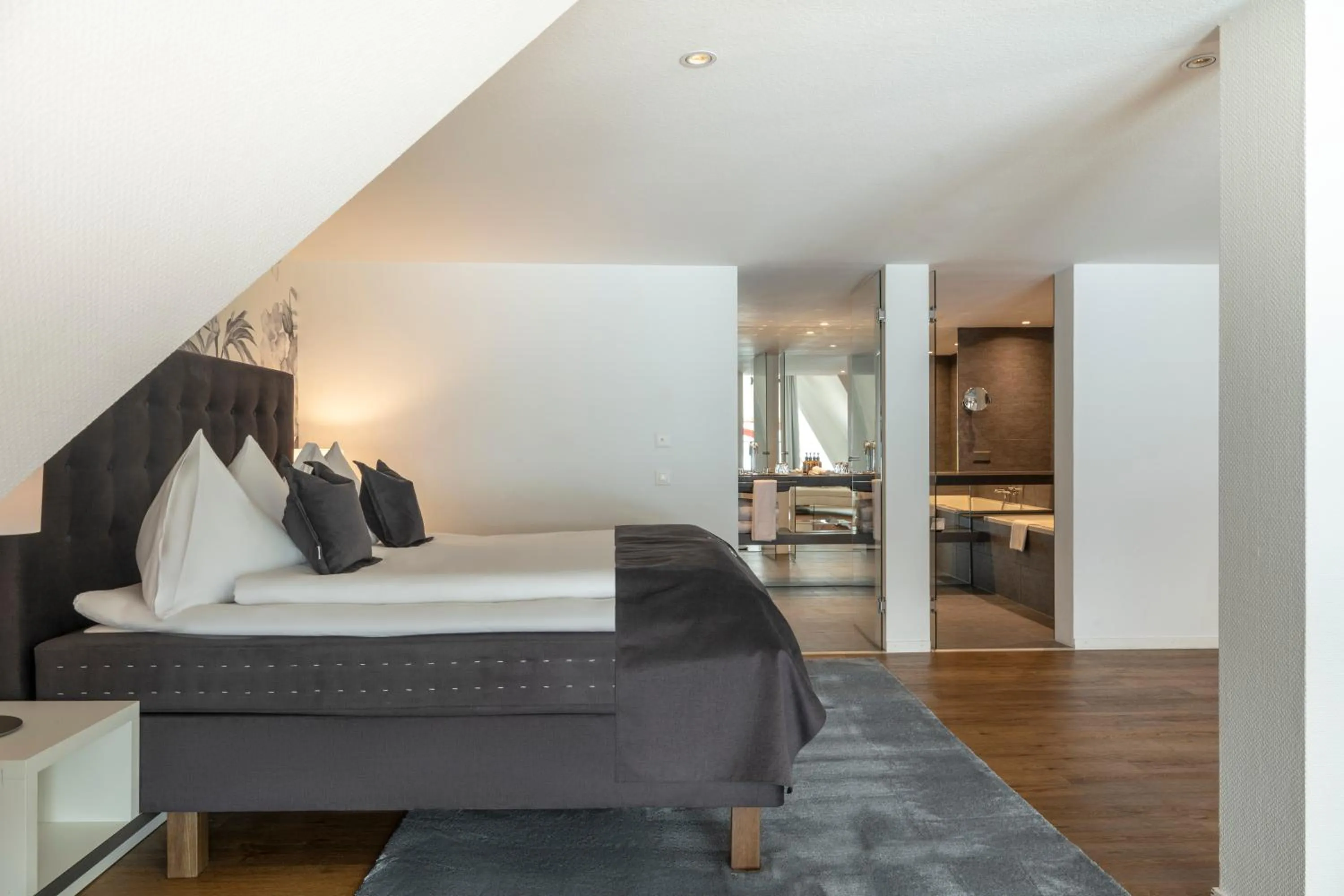 Bed in Hotel Vitznauerhof - Lifestyle Hideaway at Lake Lucerne