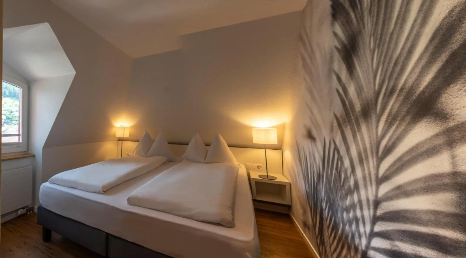 Bed in Hotel Vitznauerhof - Lifestyle Hideaway at Lake Lucerne