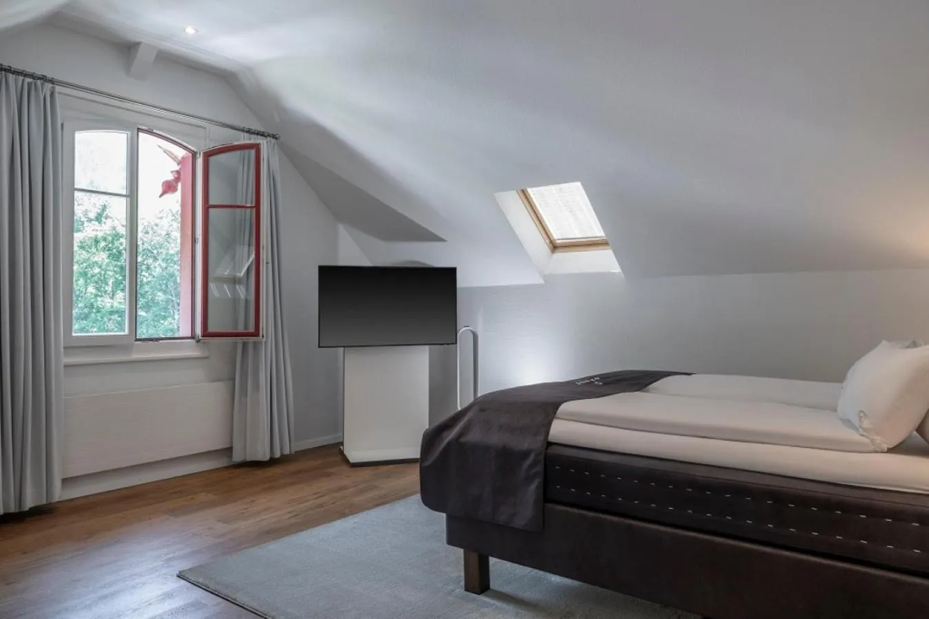 Bed in Hotel Vitznauerhof - Lifestyle Hideaway at Lake Lucerne