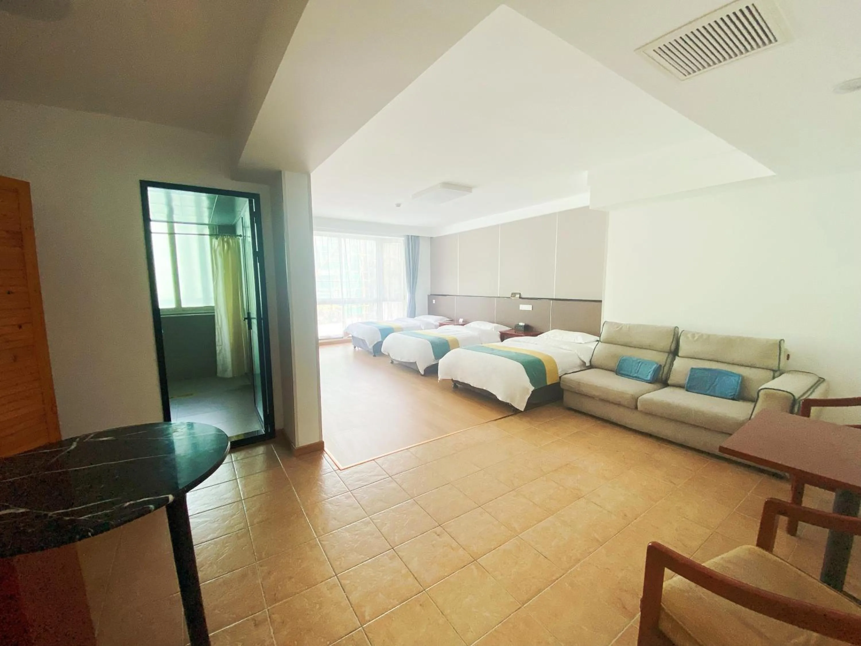 Seating area, Bed in Beijing RJ Brown City Center Hotel Tian An Men Forbidden City