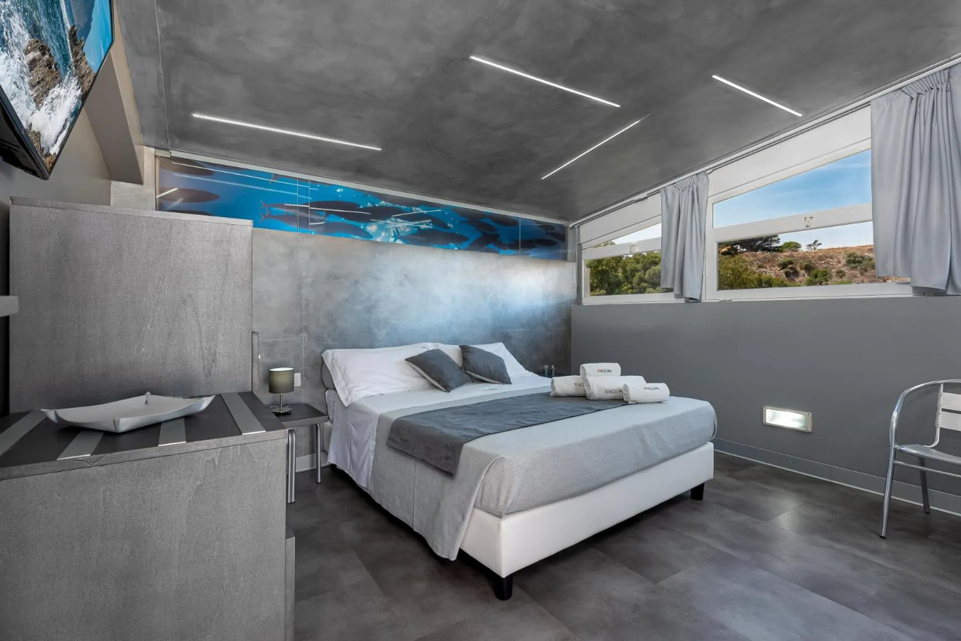 Bedroom, Bed in Rivazzurra Design Rooms