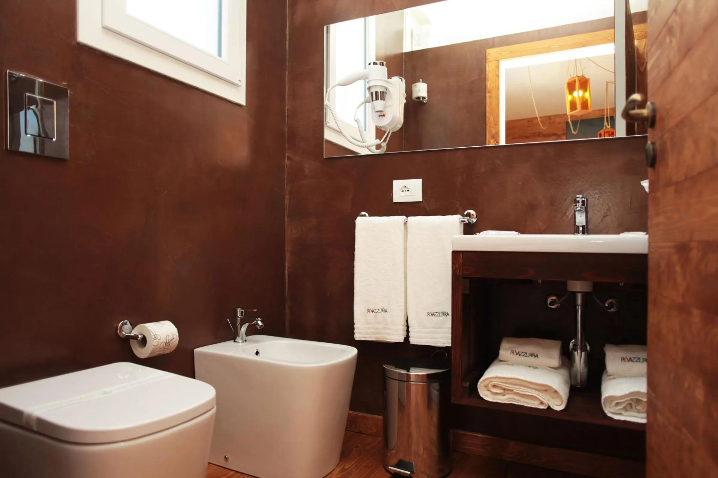 Toilet in Rivazzurra Design Rooms
