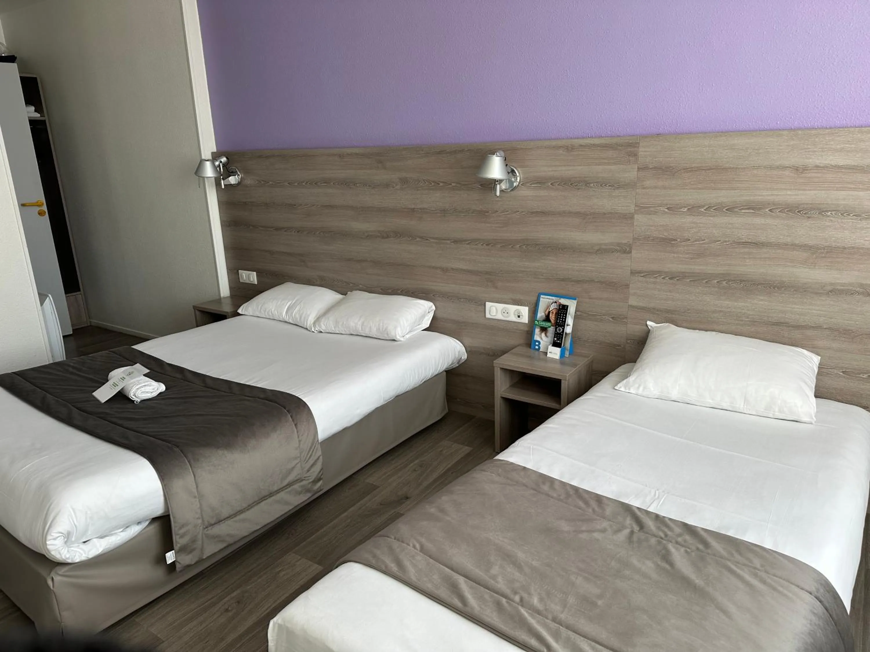 Photo of the whole room, Bed in BRIT HOTEL CONFORT NEVERS Centre Gare