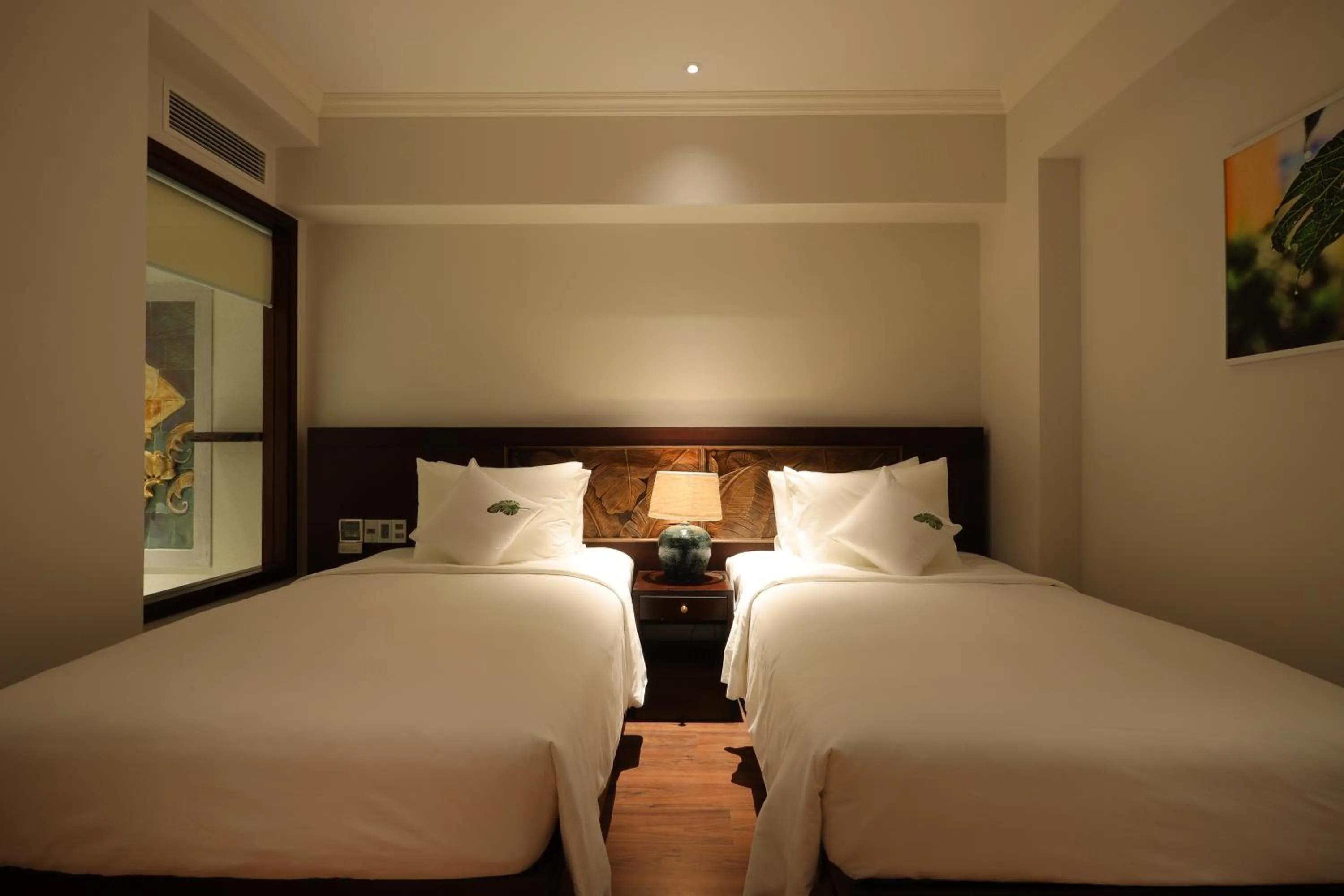 Bed in Cochin Sang Hotel