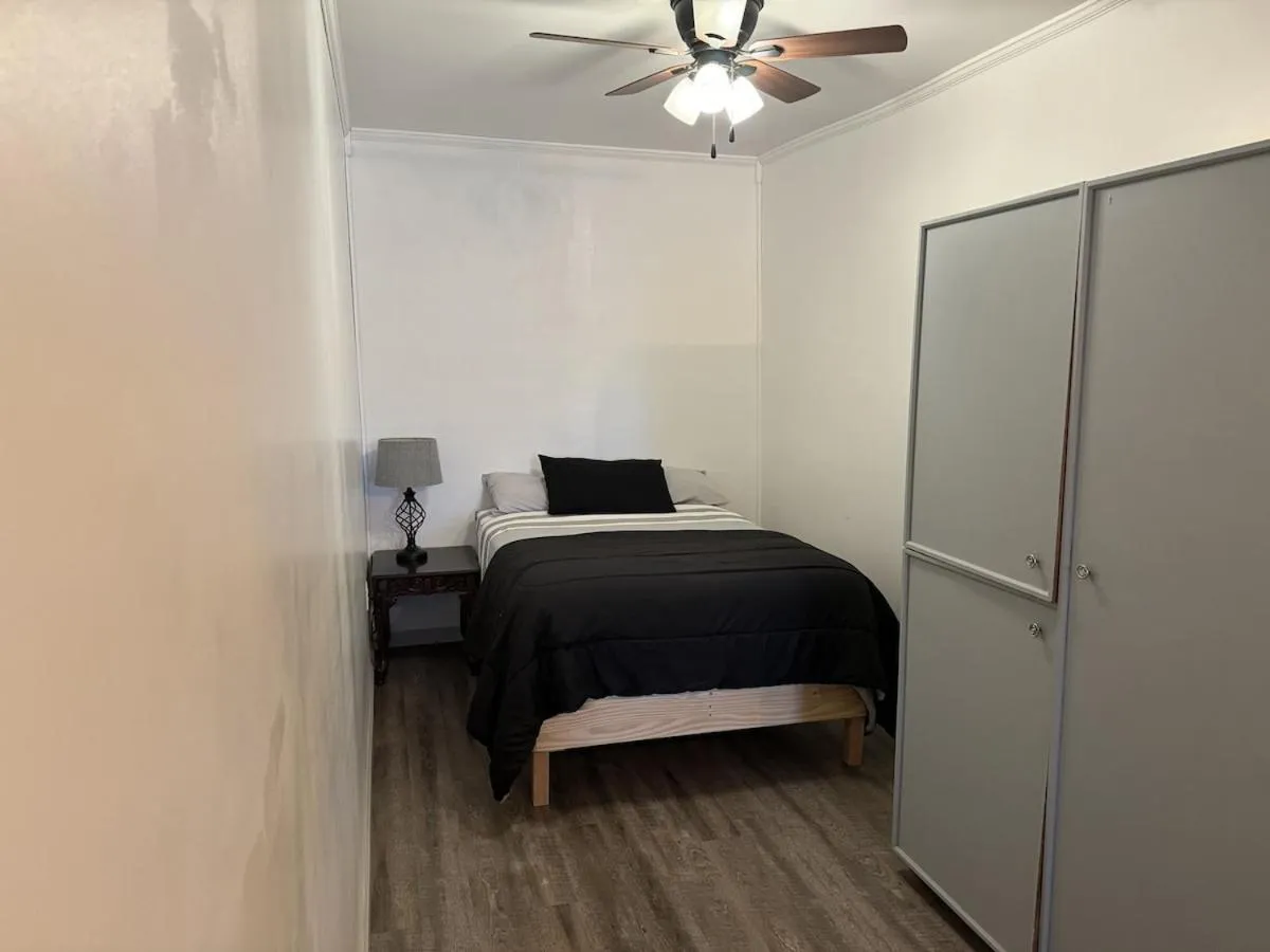 Bed in Fenway House Hotel