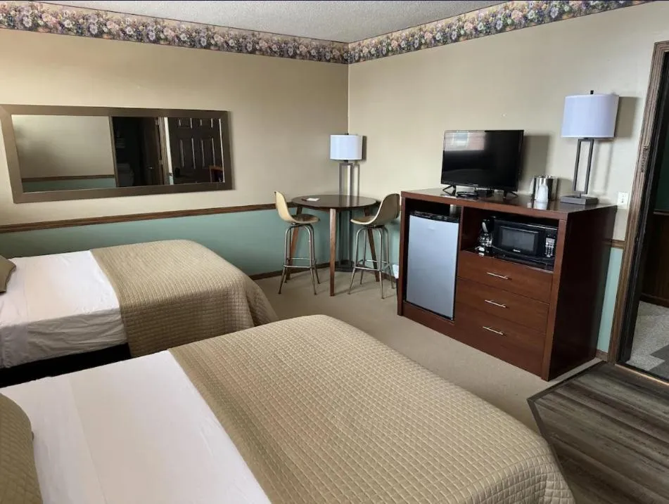 Bed in Fenway House Hotel