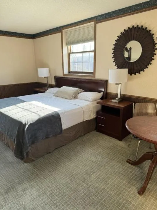 Bed in Fenway House Hotel