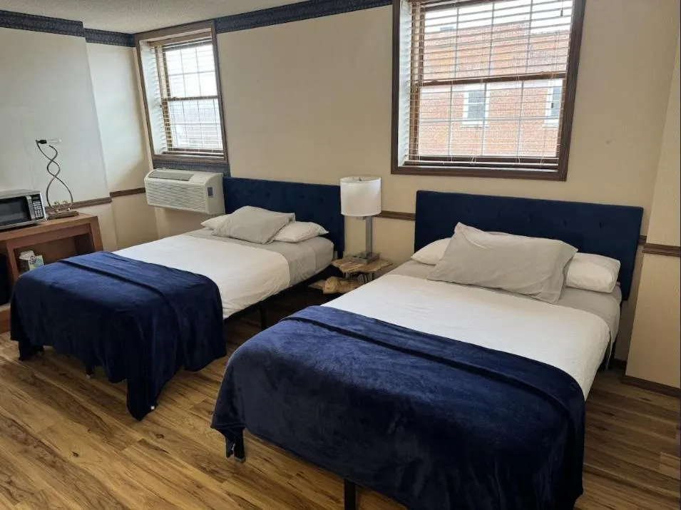 Bed in Fenway House Hotel