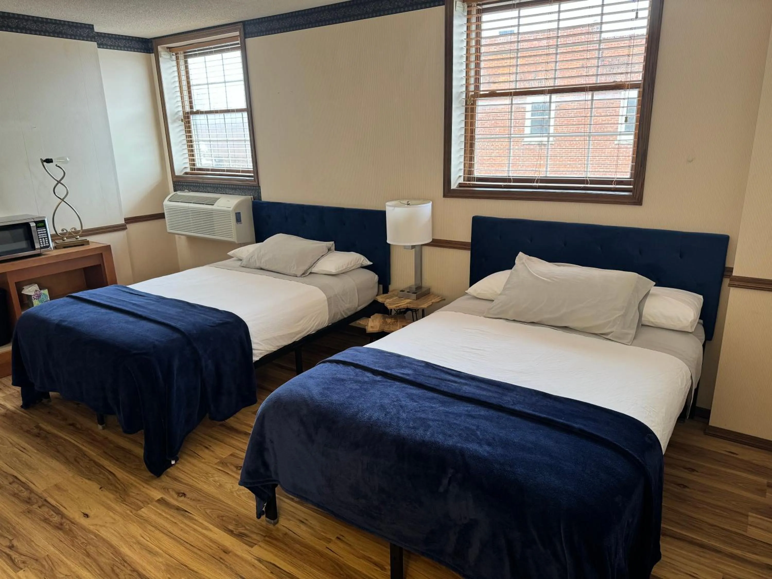 Bed in Fenway House Hotel