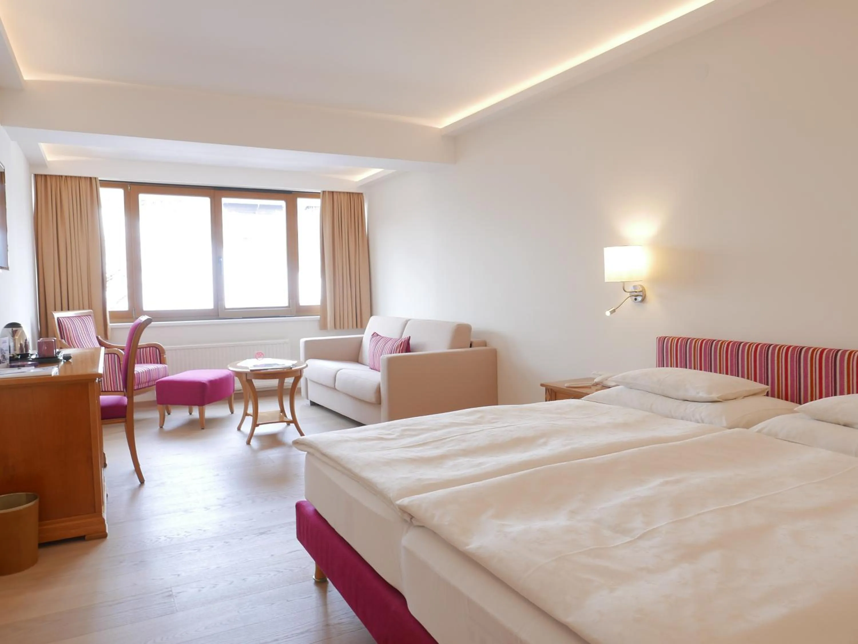 Photo of the whole room, Bed in ALPIN- Das Sporthotel - SKI IN SKI OUT cityXpress, SUMMERCARD INCLUDED