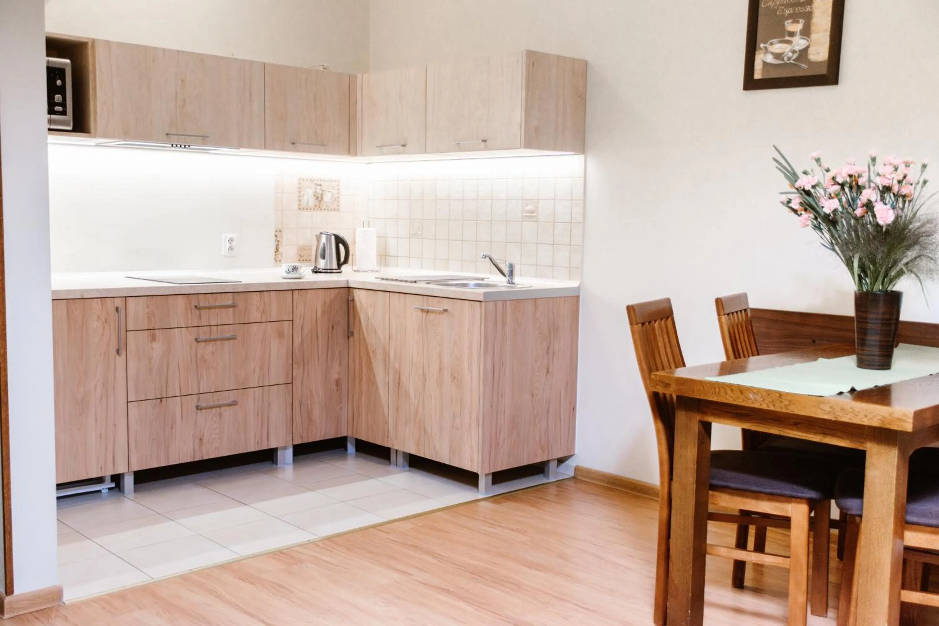 Kitchen or kitchenette in Aparthotel Bellamonte