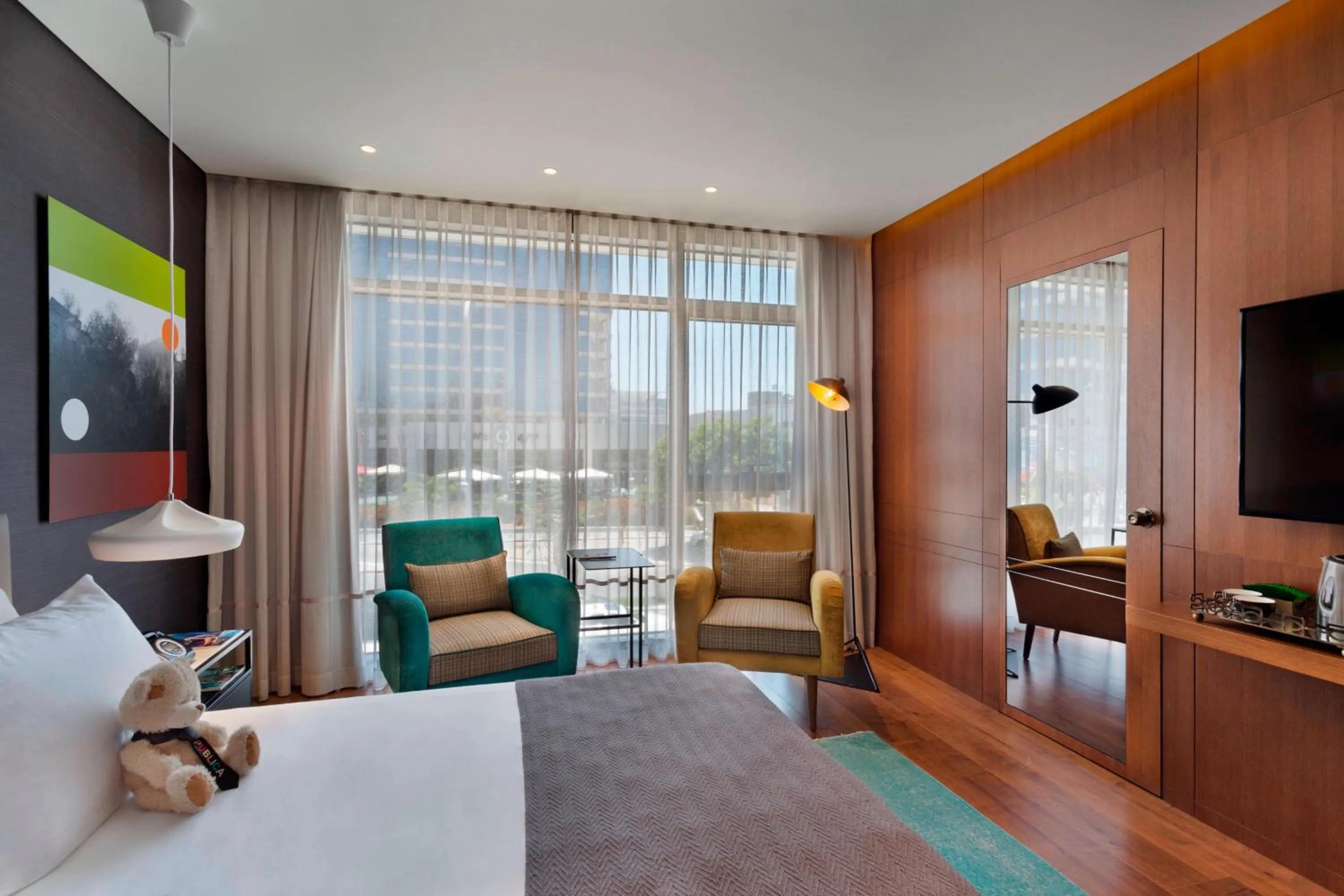 Photo of the whole room, Bed in Publica Isrotel, Autograph Collection