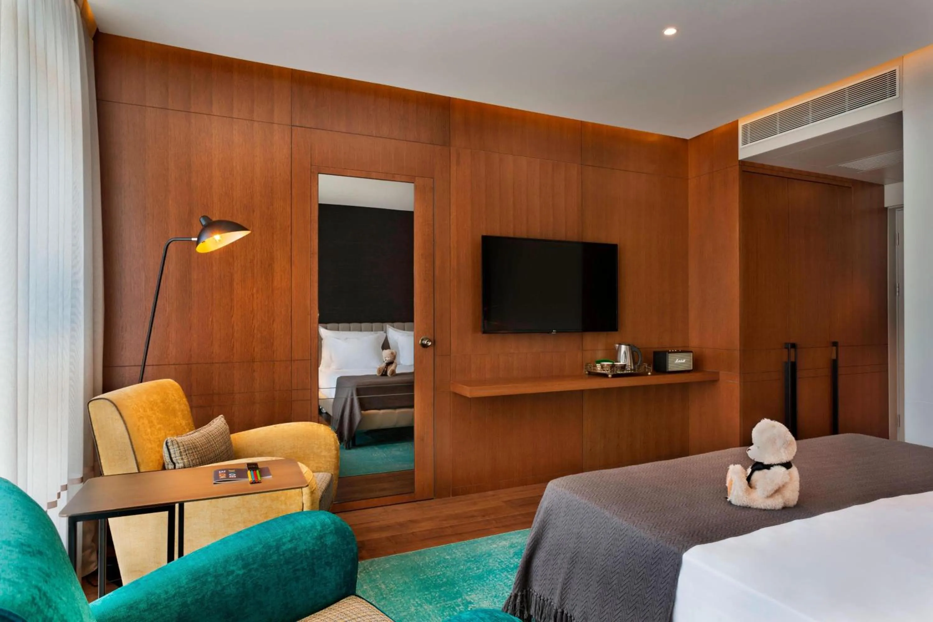 Photo of the whole room, Bed in Publica Isrotel, Autograph Collection