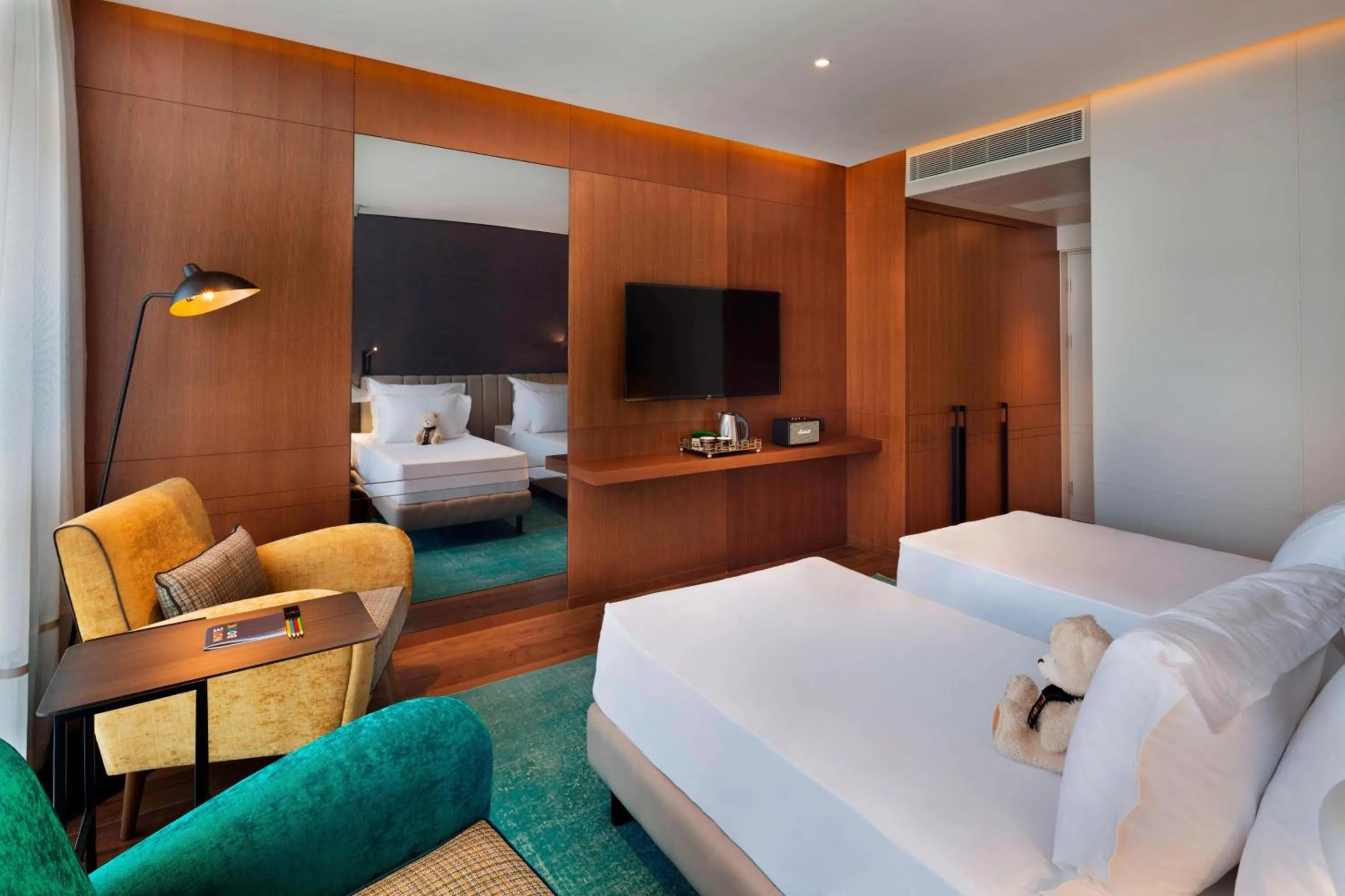 Photo of the whole room, Bed in Publica Isrotel, Autograph Collection