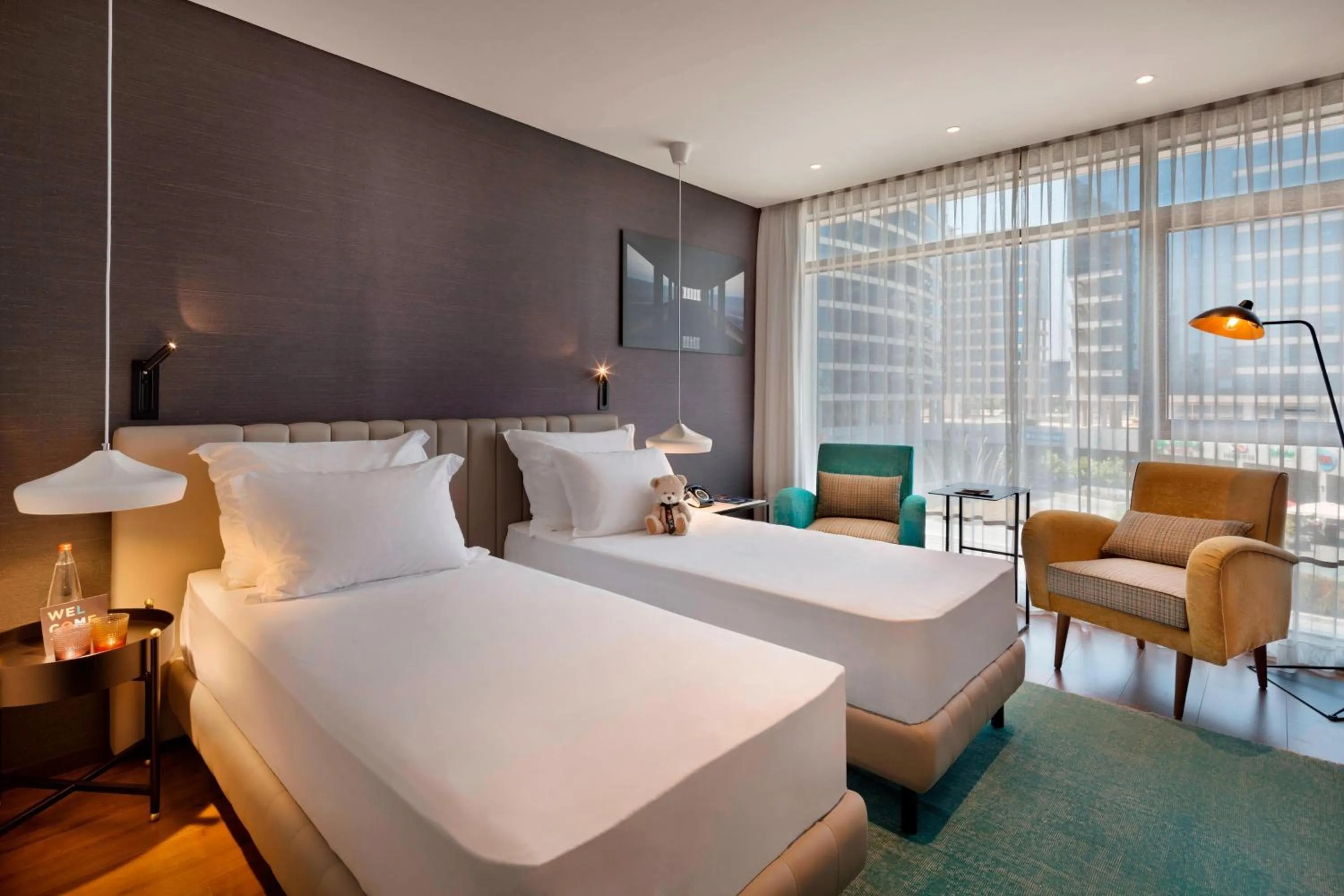 Photo of the whole room, Bed in Publica Isrotel, Autograph Collection