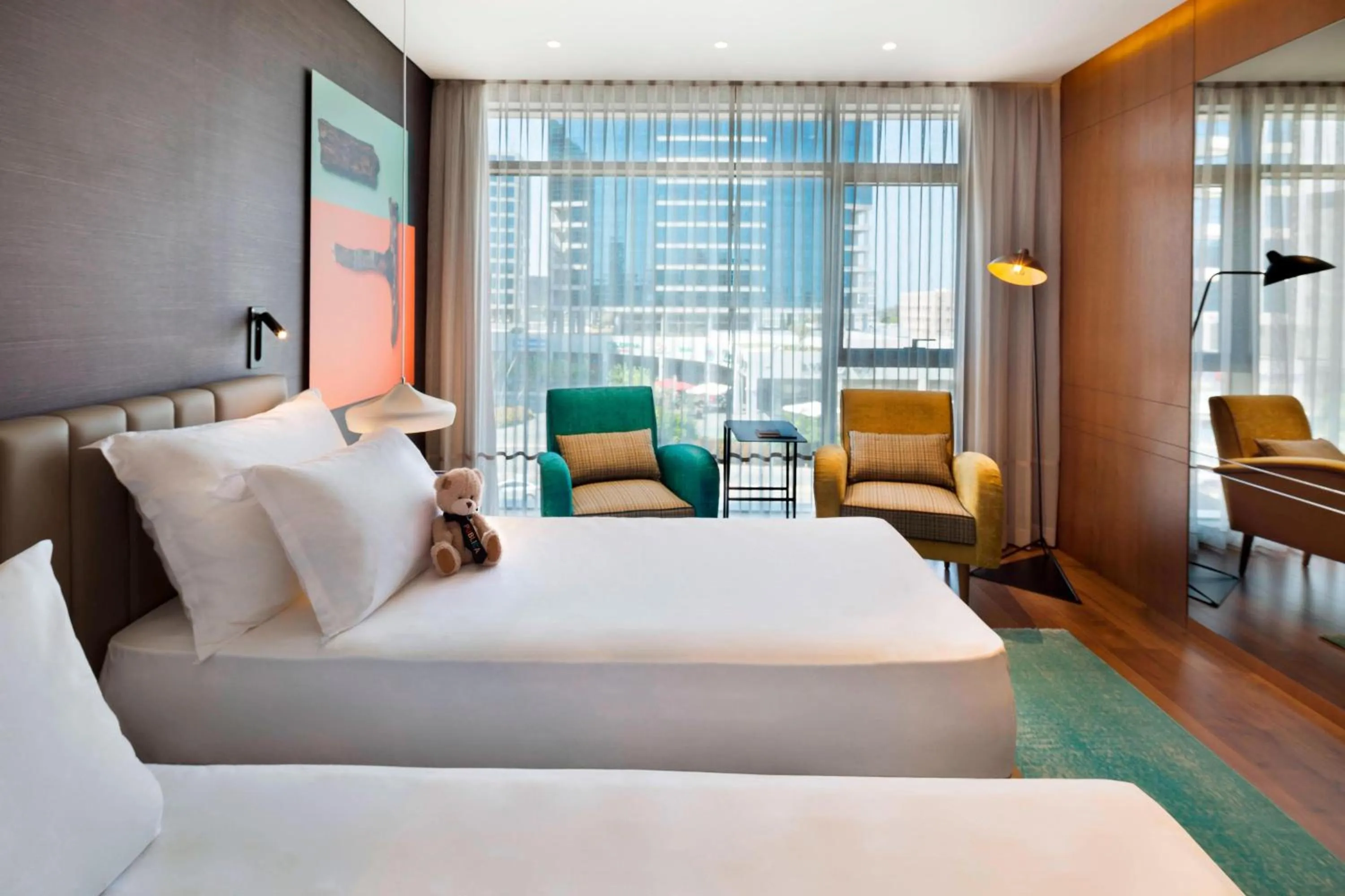 Photo of the whole room, Bed in Publica Isrotel, Autograph Collection