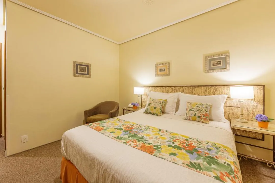 Bed in Hotel Pousada Le Chateau