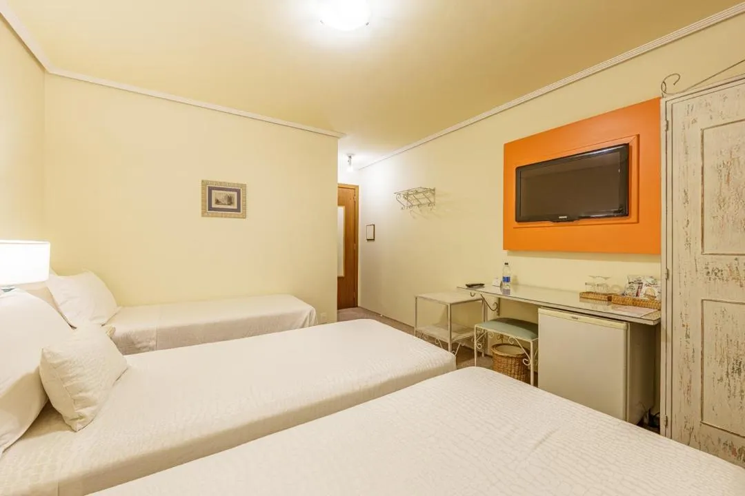 Bed in Hotel Pousada Le Chateau