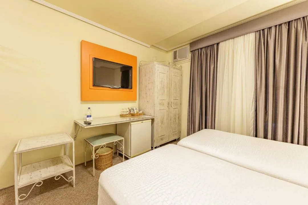 Bed in Hotel Pousada Le Chateau