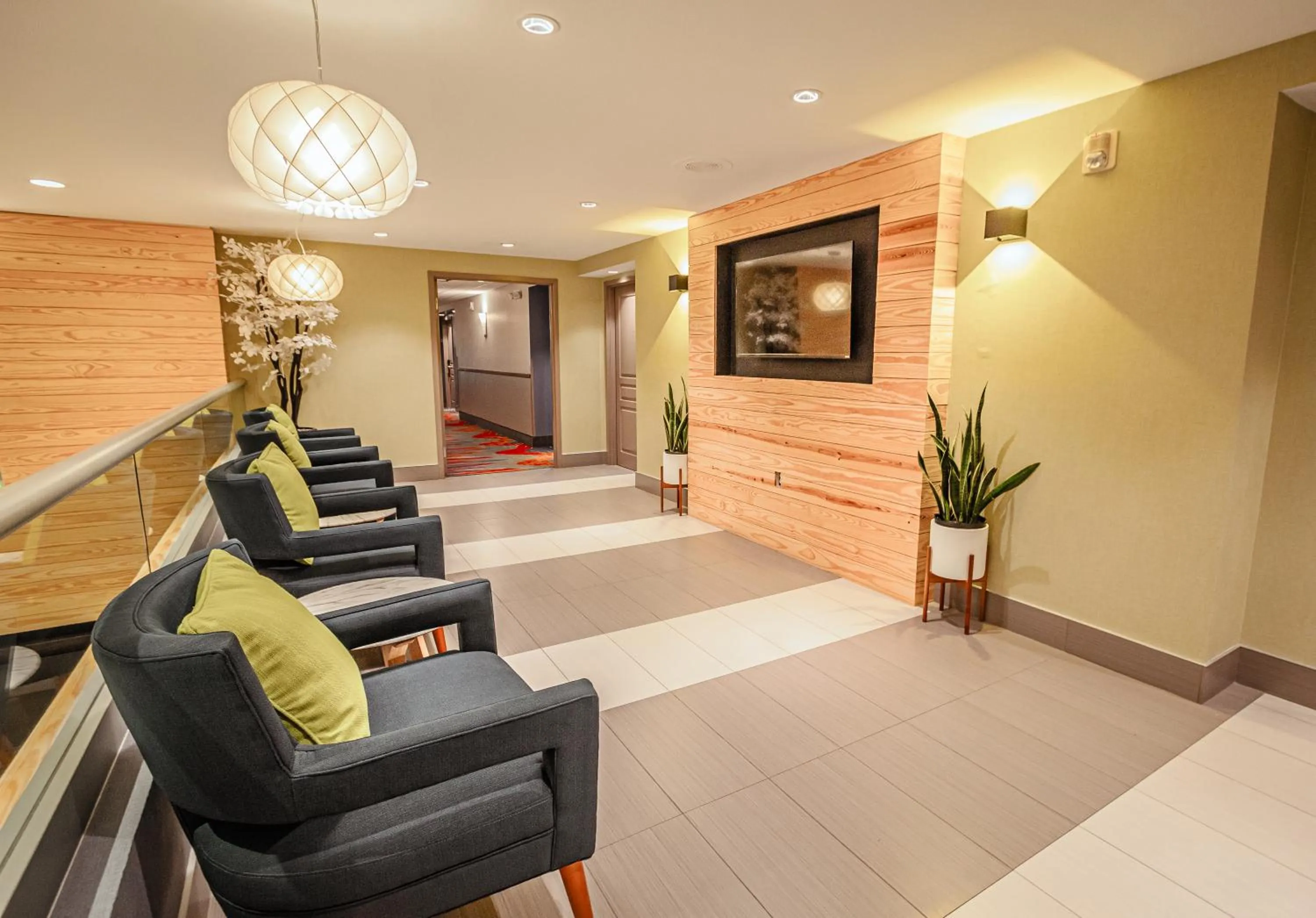 Lobby or reception in Days Inn & Suites by Wyndham Fort Myers Near JetBlue Park