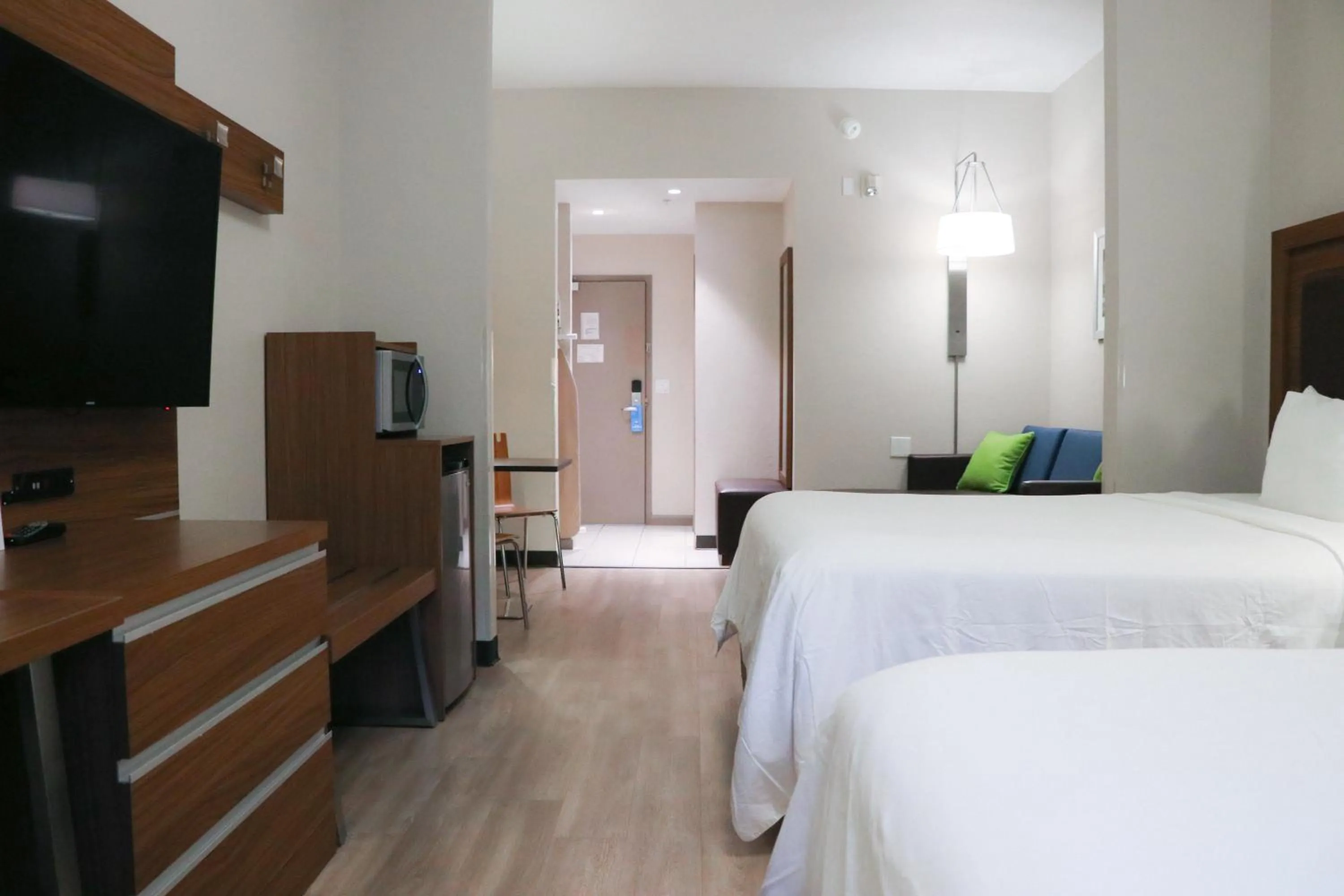 Photo of the whole room, Bed in Days Inn & Suites by Wyndham Fort Myers Near JetBlue Park