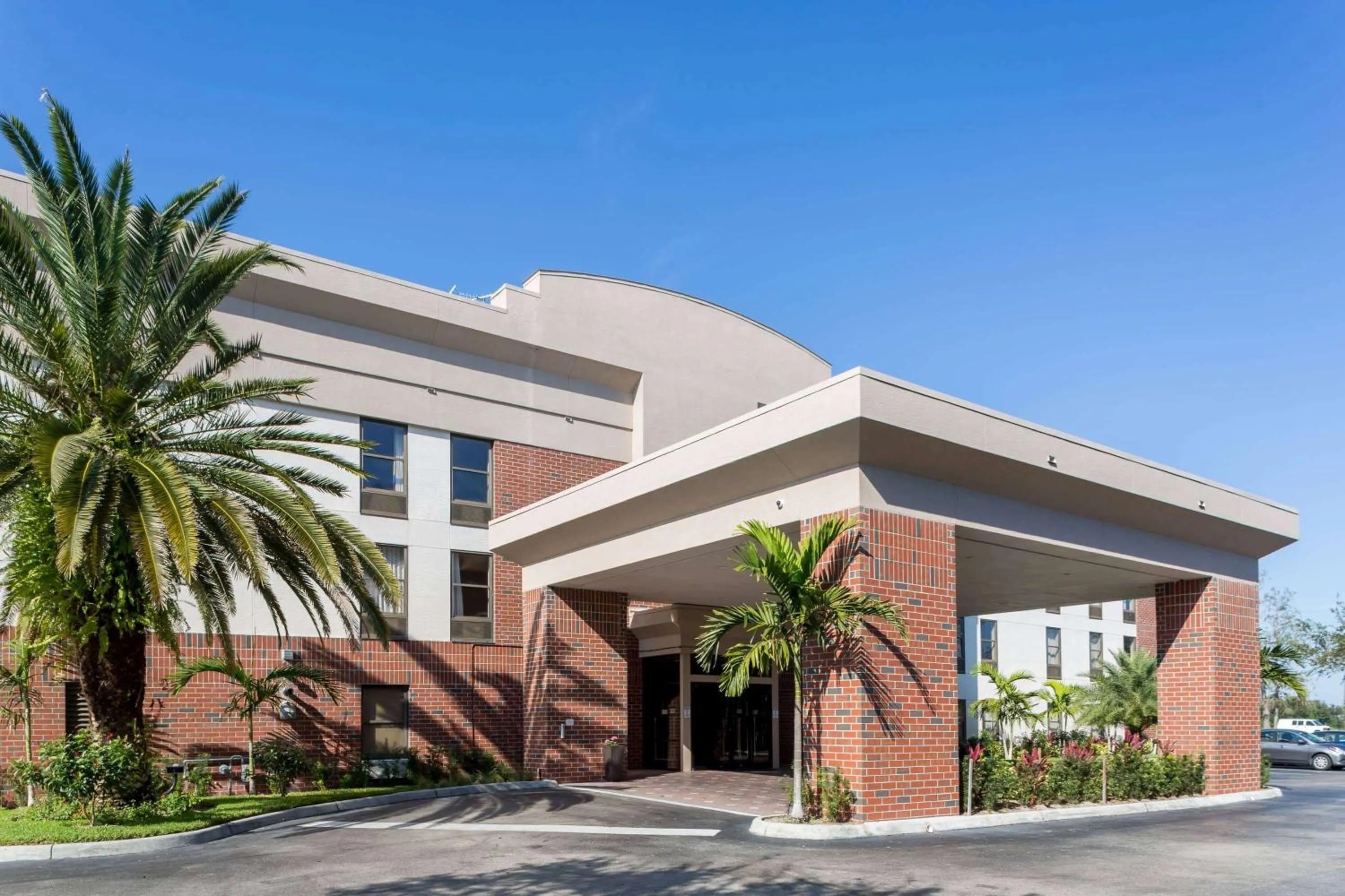 Property building in Days Inn & Suites by Wyndham Fort Myers Near JetBlue Park
