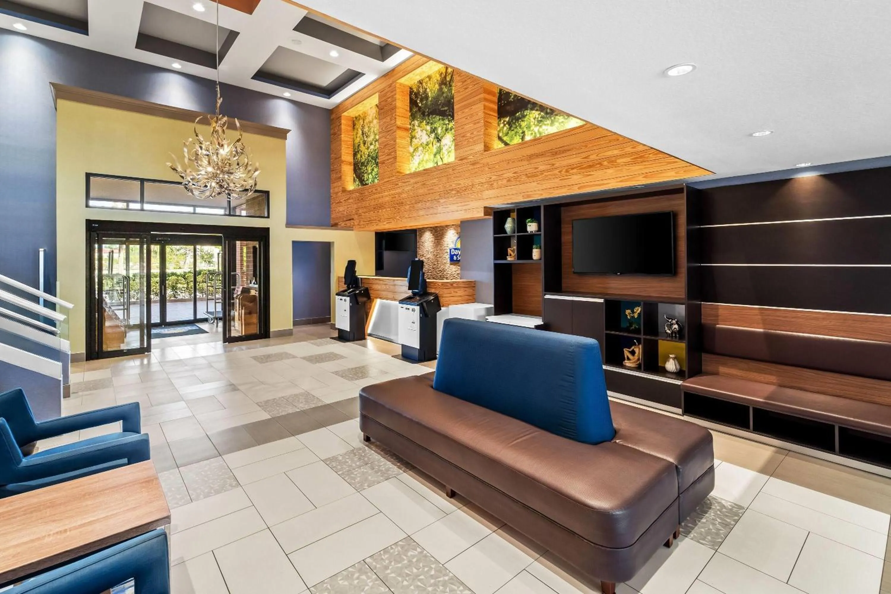 Lobby or reception in Days Inn & Suites by Wyndham Fort Myers Near JetBlue Park