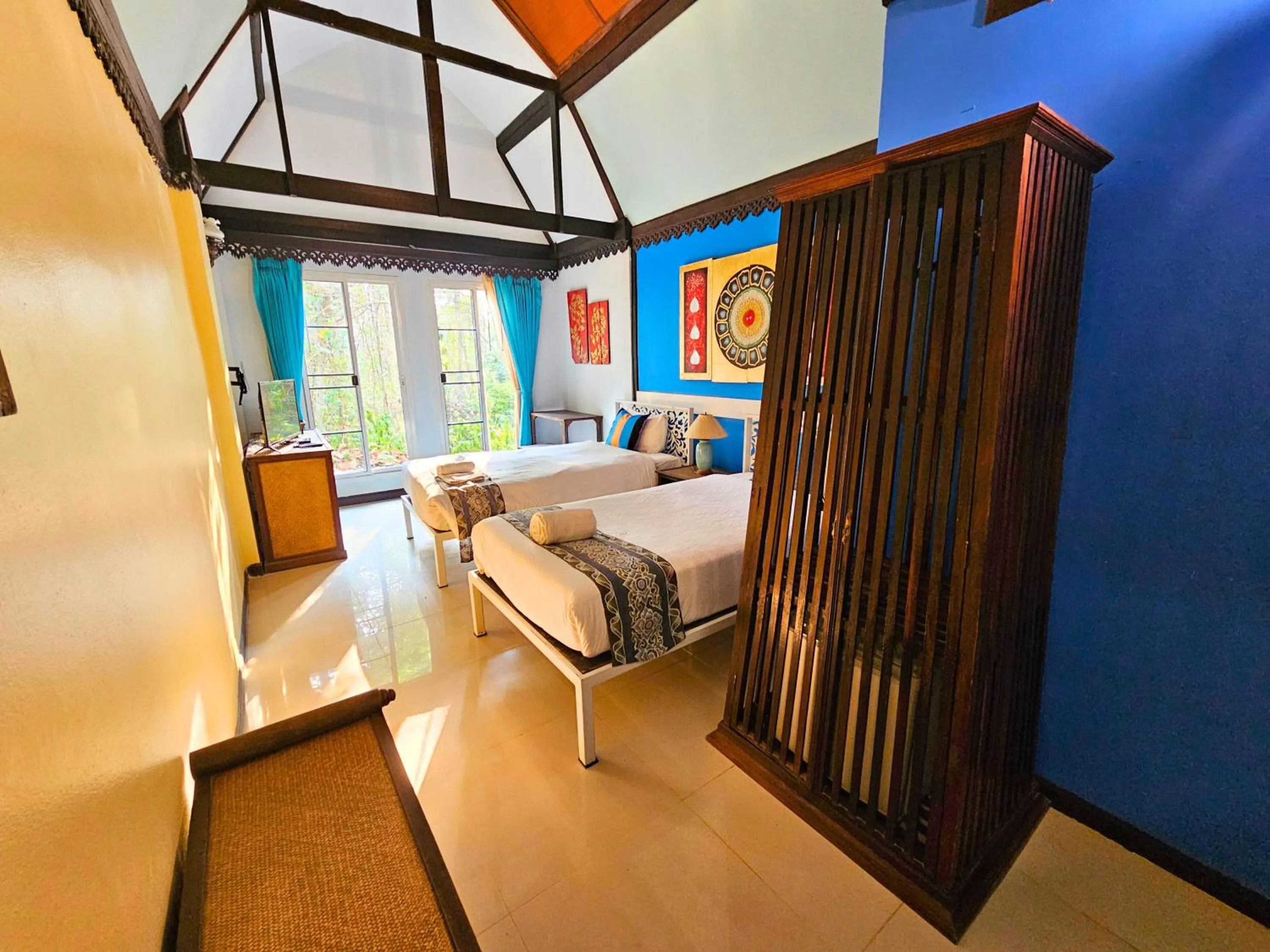 Bed in Phu Jaya Floresta Resort by ALPHATEL PARTNER