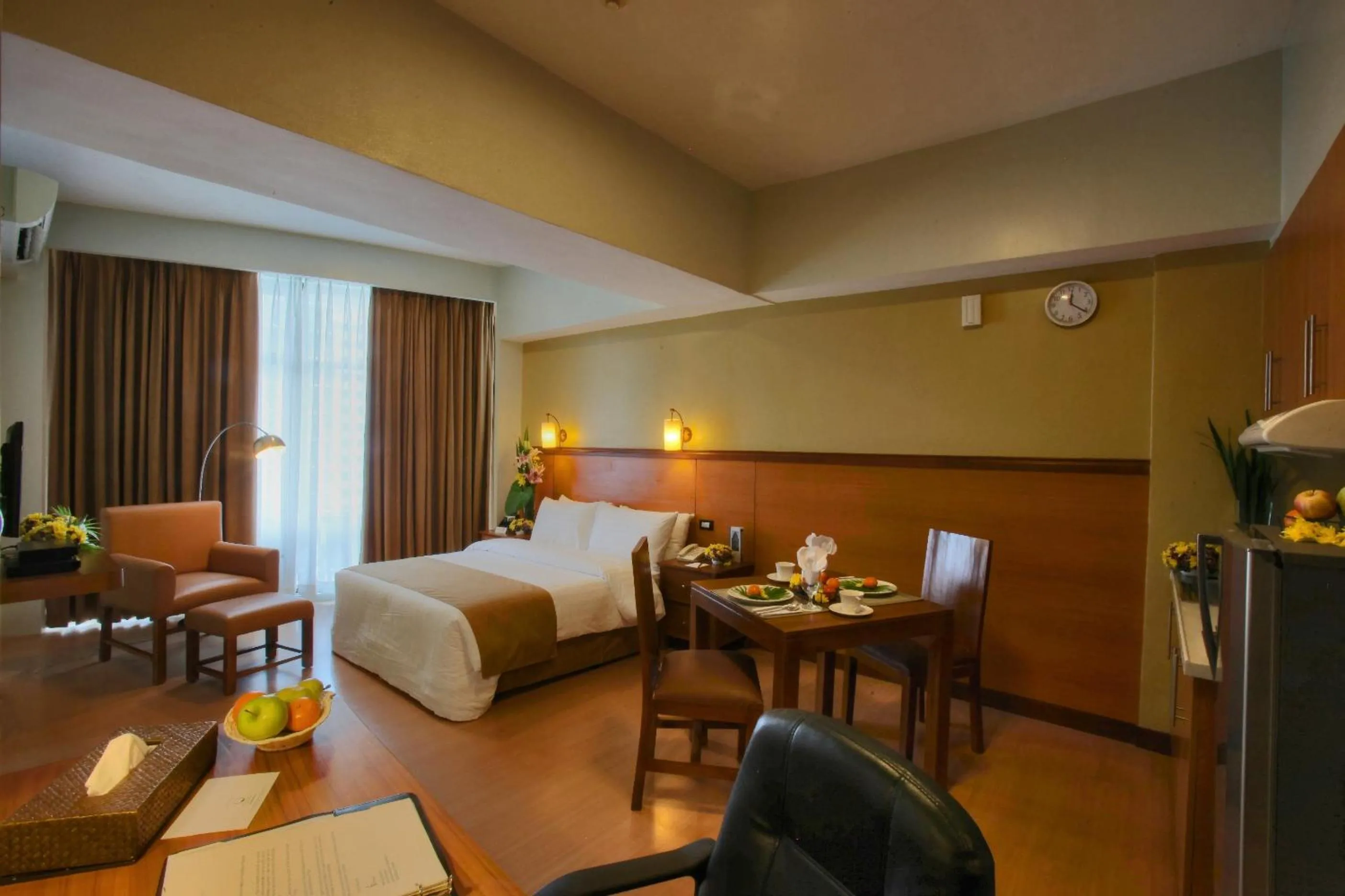 Photo of the whole room, Bed in The Malayan Plaza Hotel