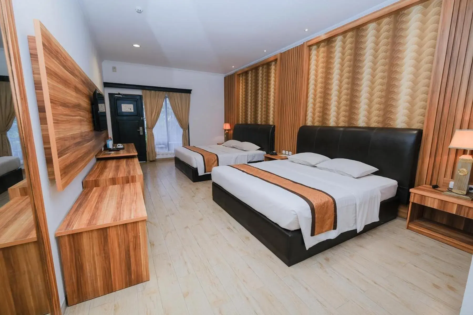 Family Room with Balcony in The Grand Palace Hotel Yogyakarta Family Room with Balcony in The Grand Palace Hotel Yogyakarta