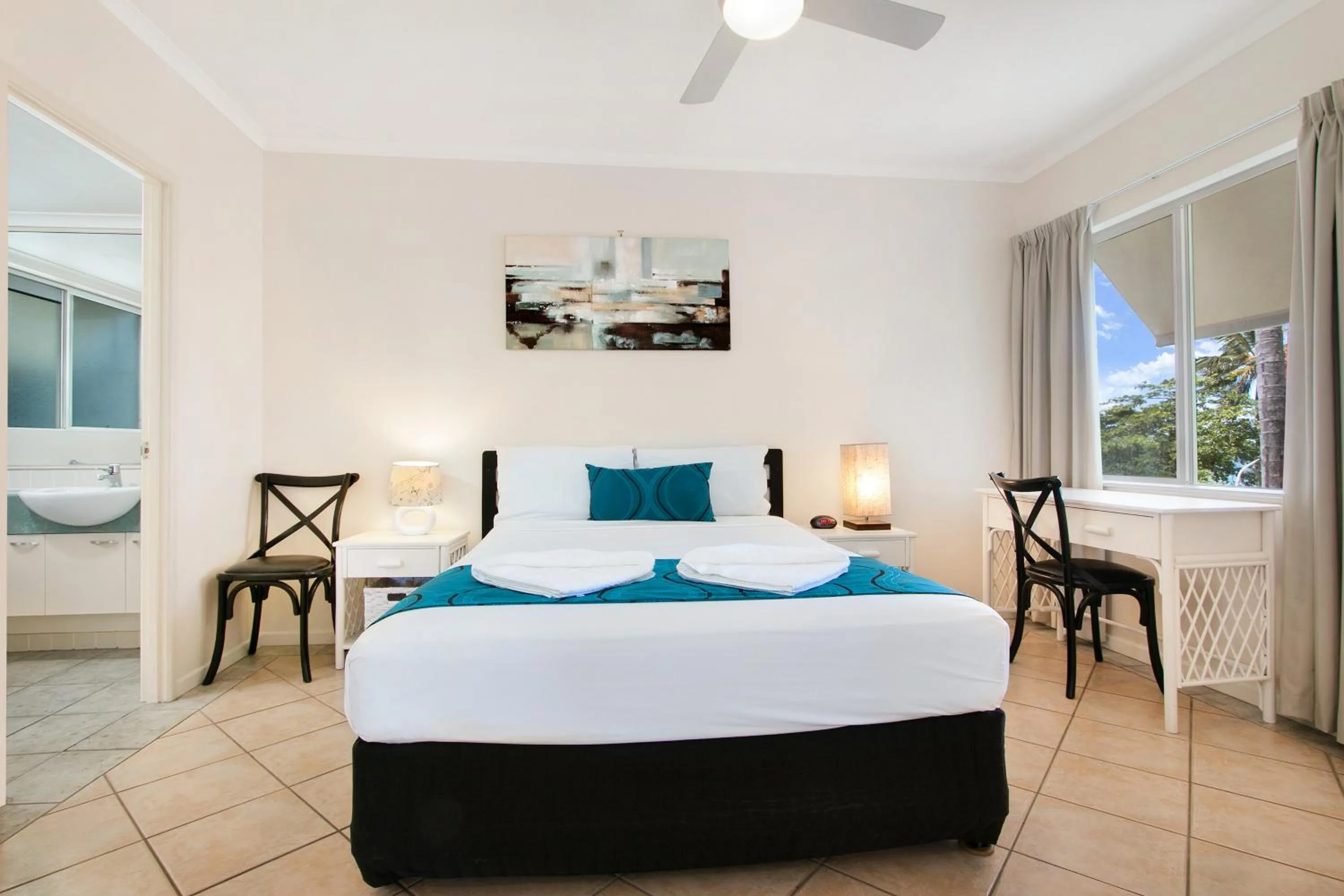 Bed in Trinity Waters Boutique Beachfront