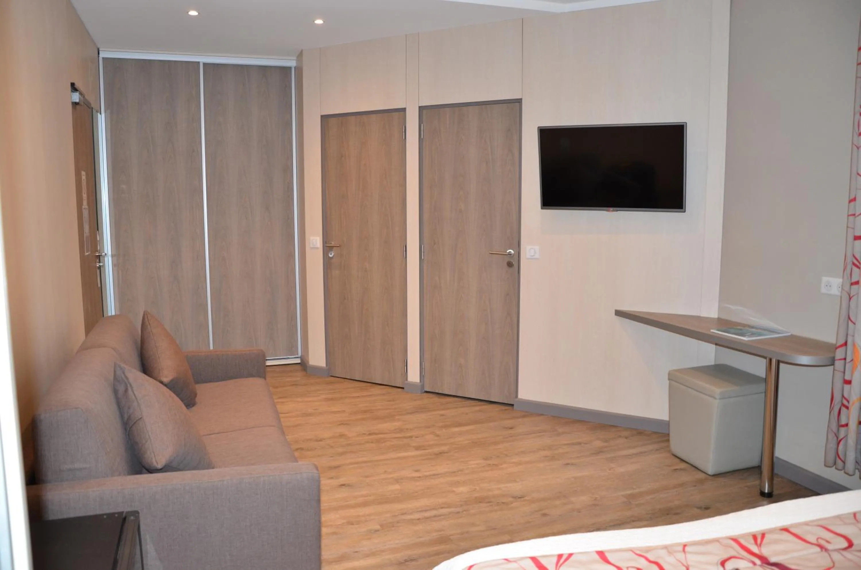 Seating area in Brit Hotel Confort Le Revest Sainte-Maxime