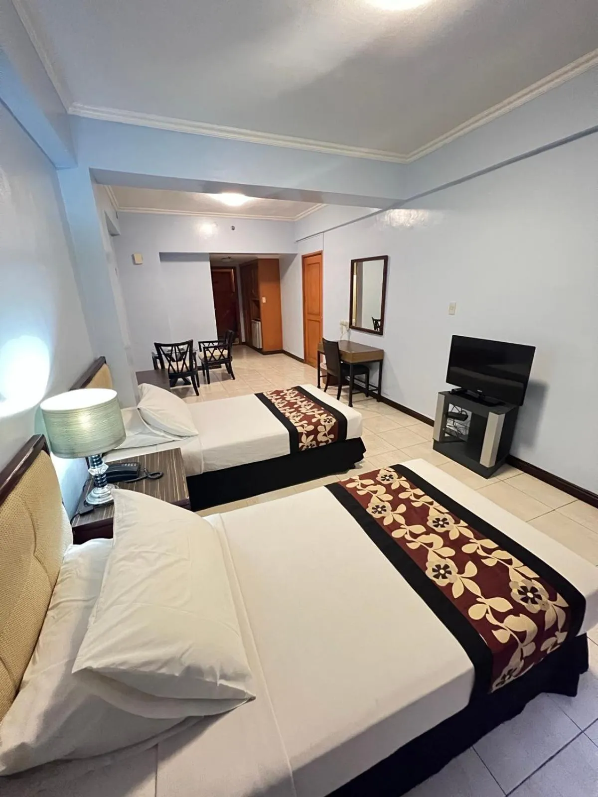 Bed in Jupiter Suites