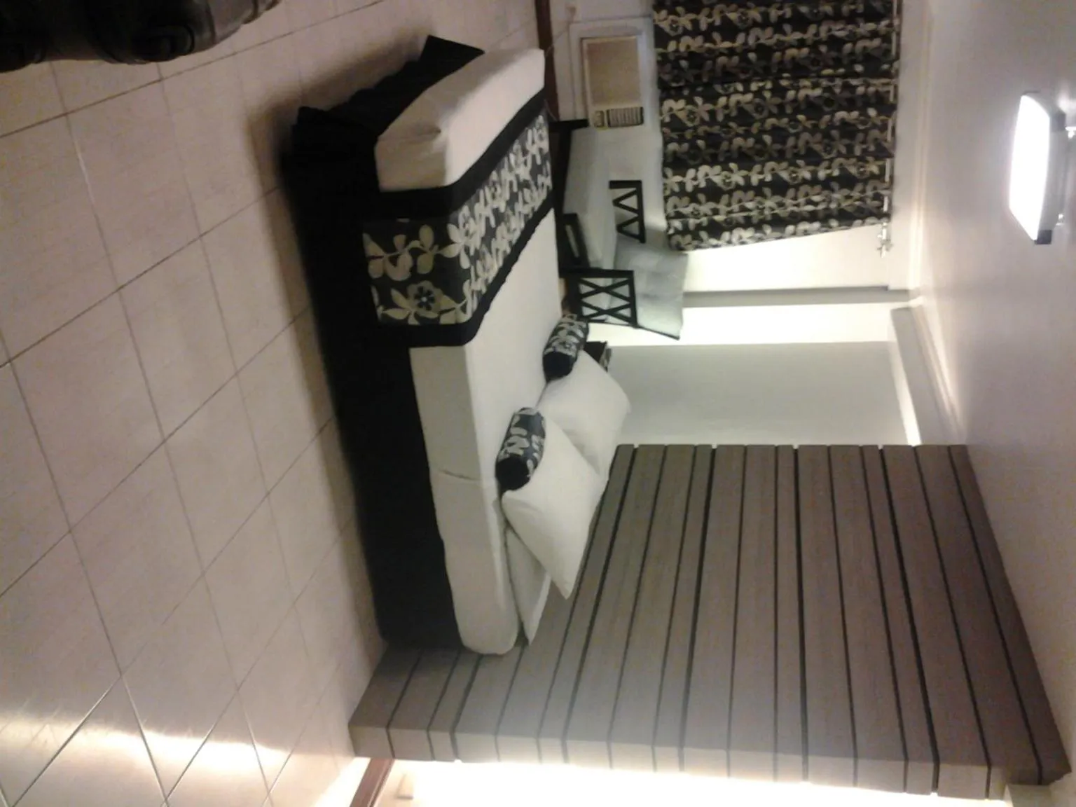 Bed in Jupiter Suites