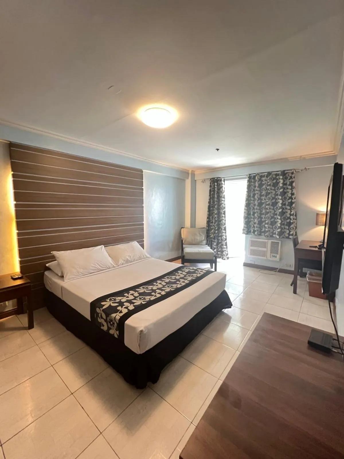 Bed in Jupiter Suites