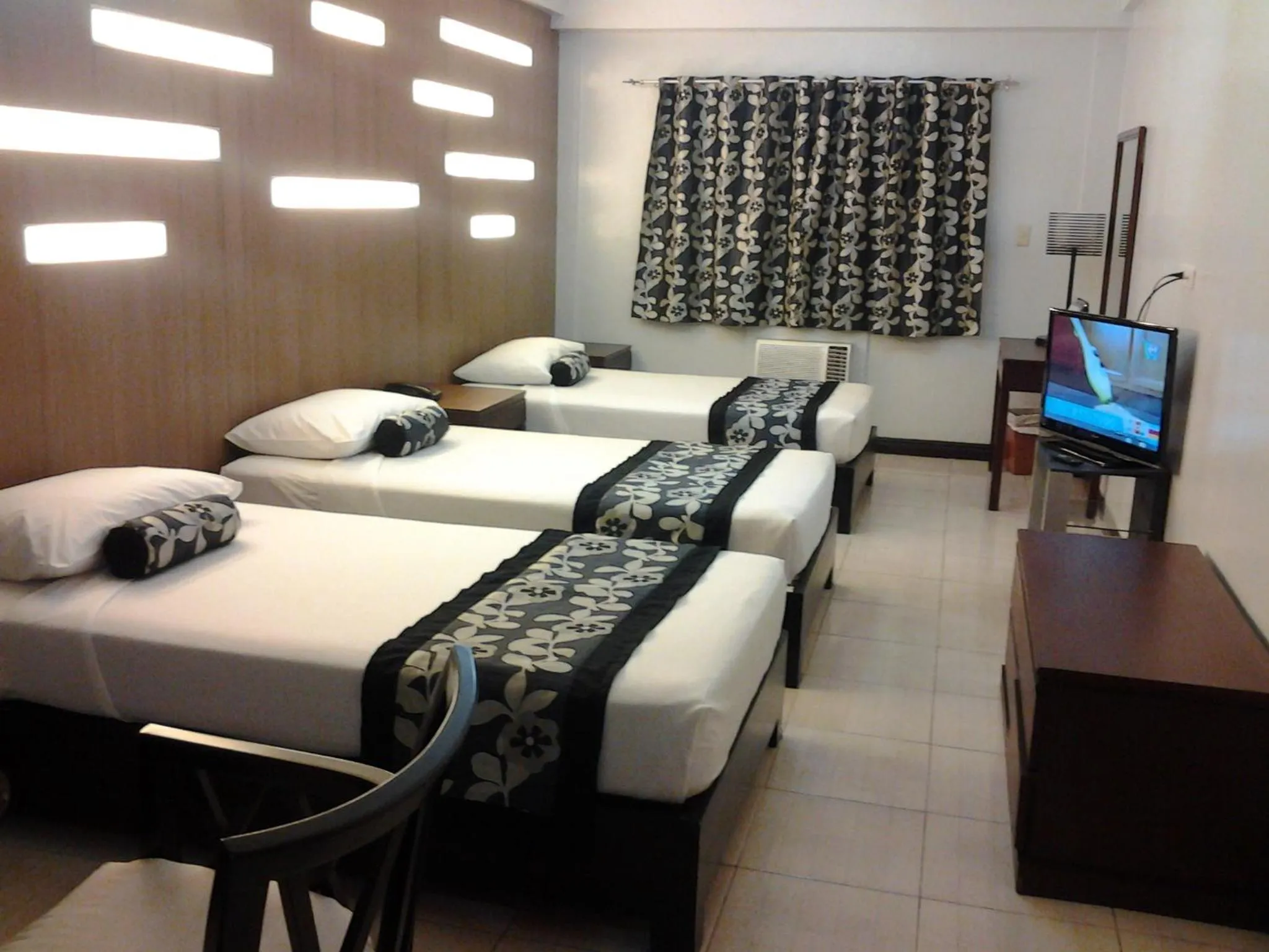 Bed in Jupiter Suites