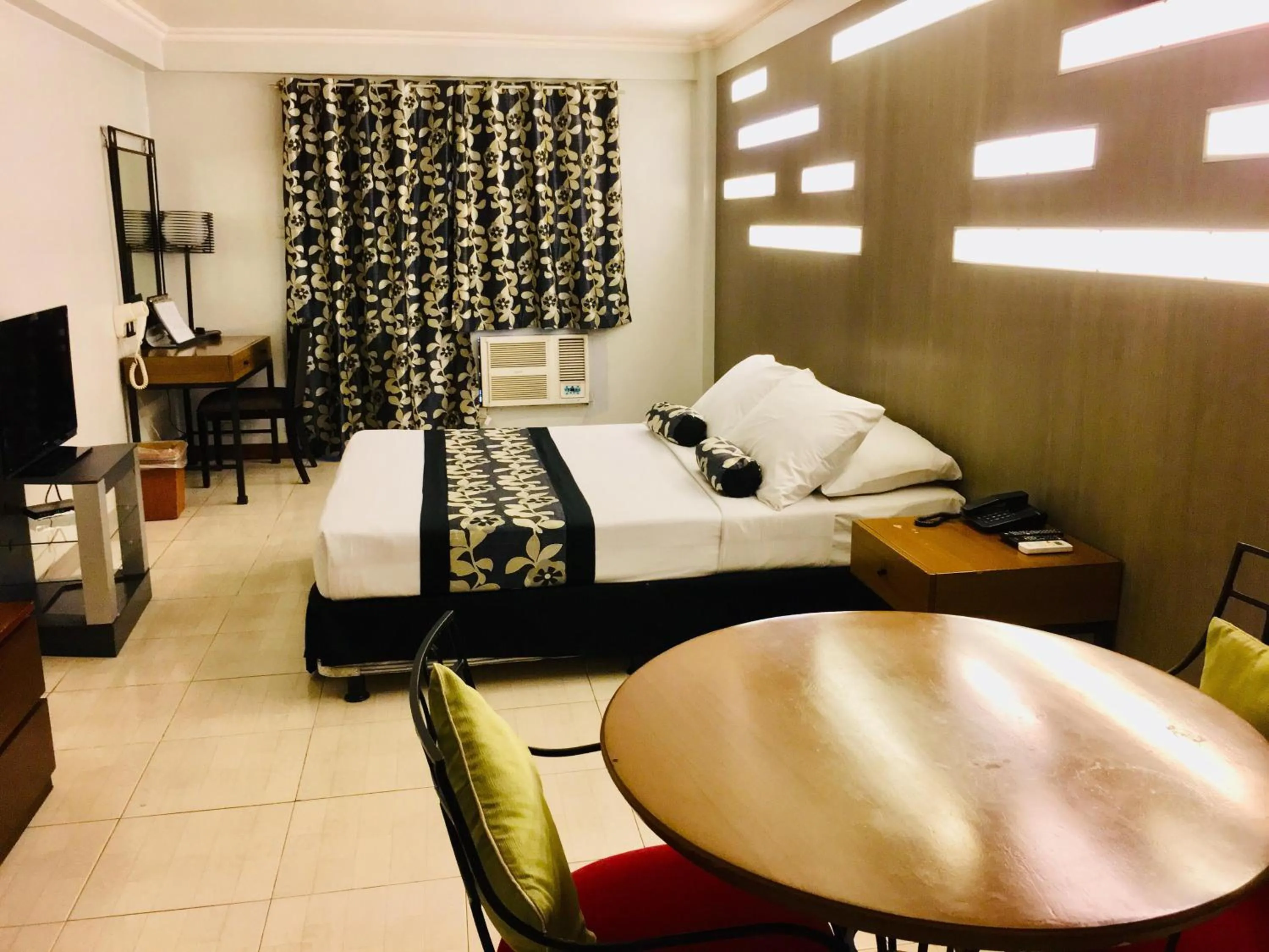 Bed in Jupiter Suites