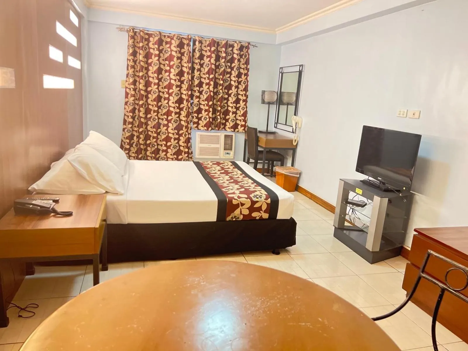 Bed in Jupiter Suites