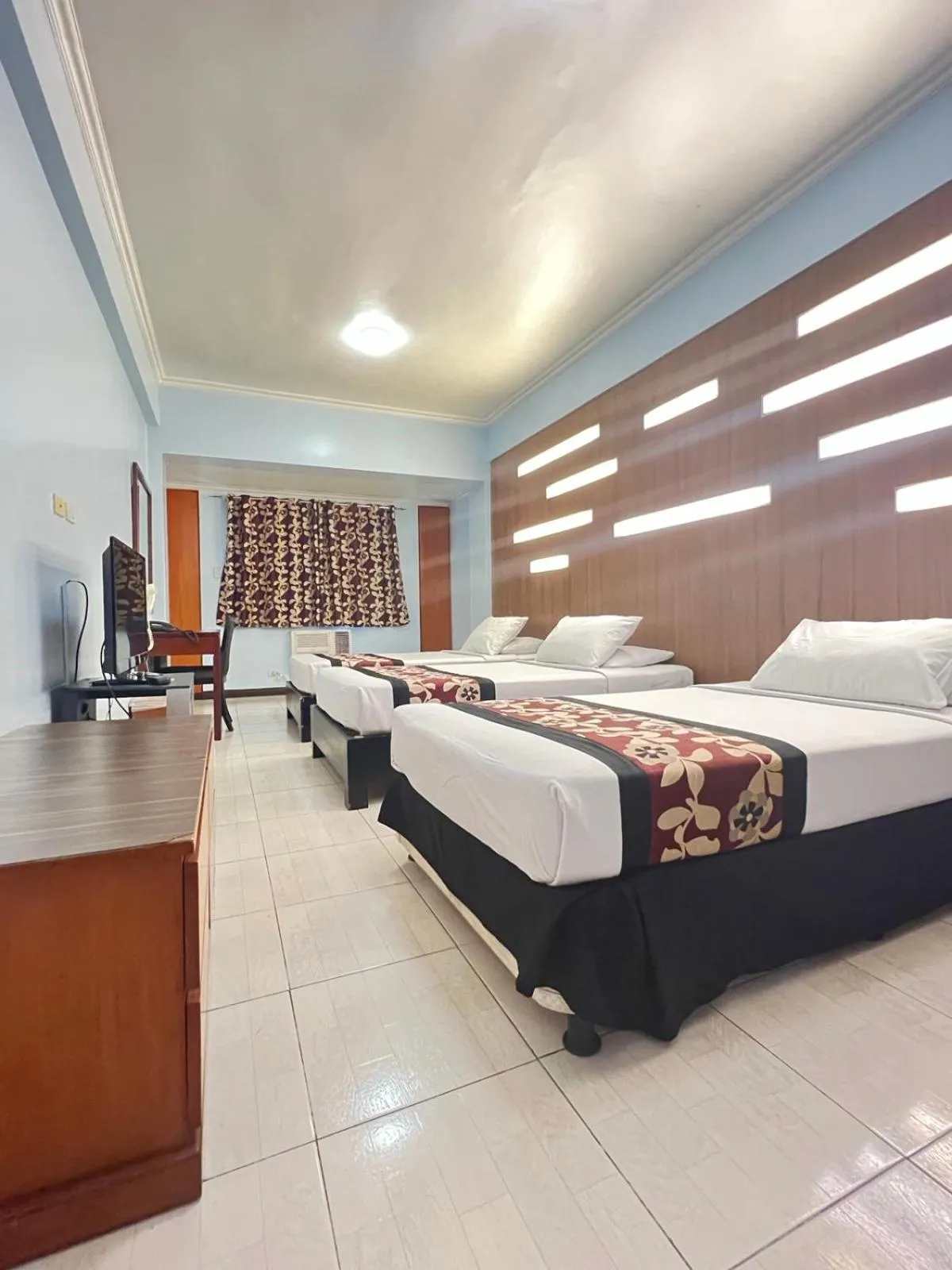 Bed in Jupiter Suites