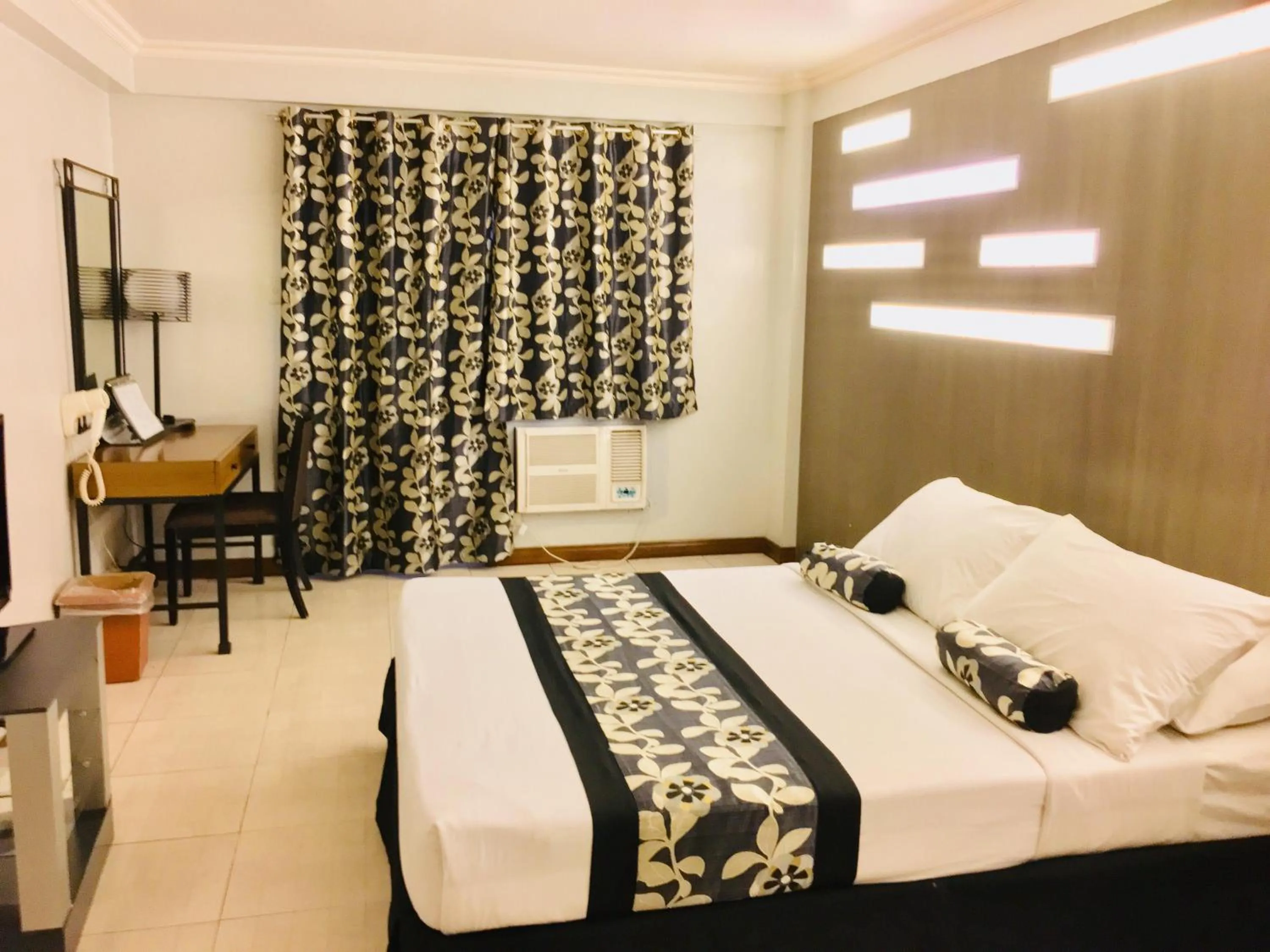 Bed in Jupiter Suites