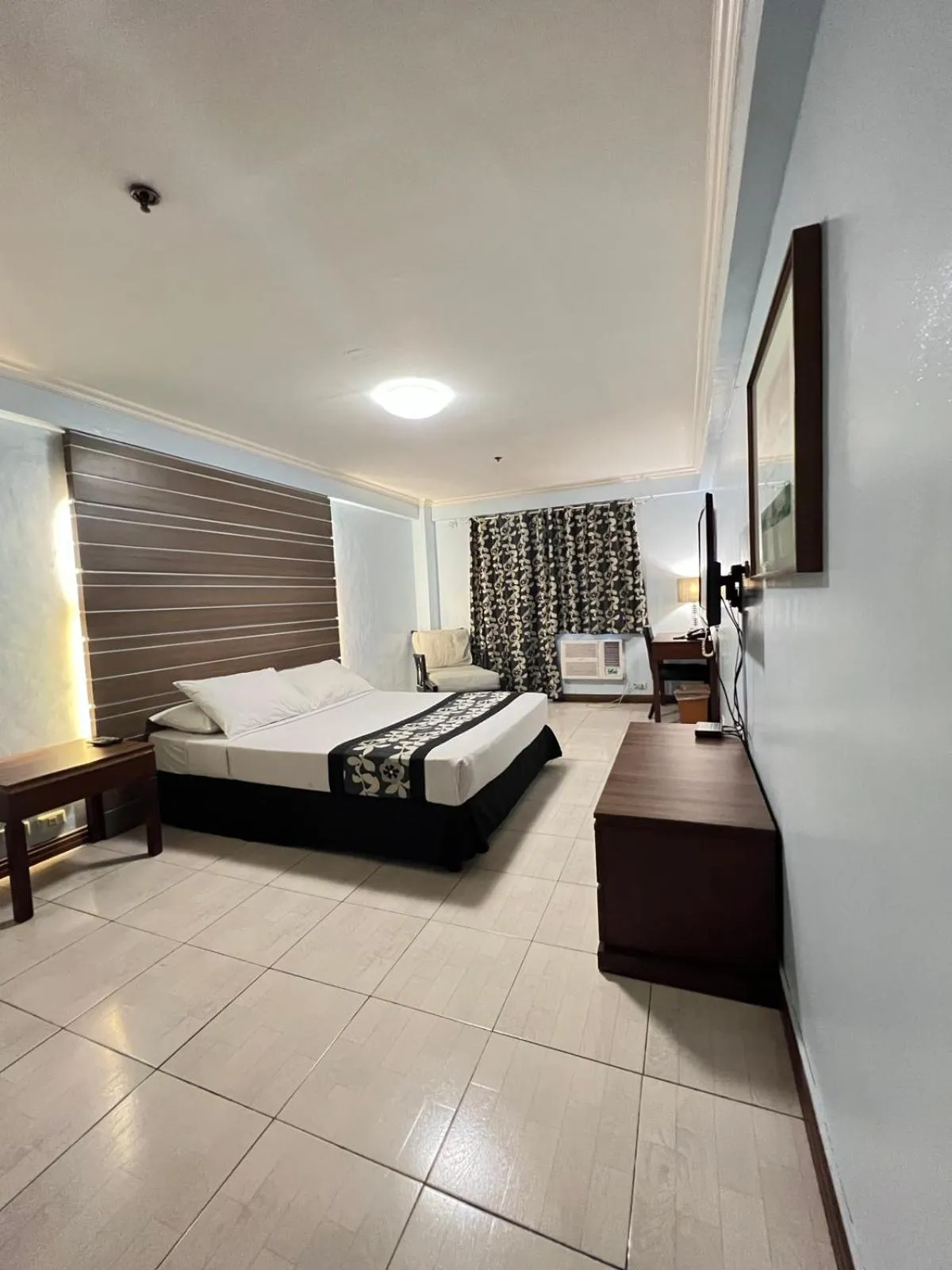 Bed in Jupiter Suites