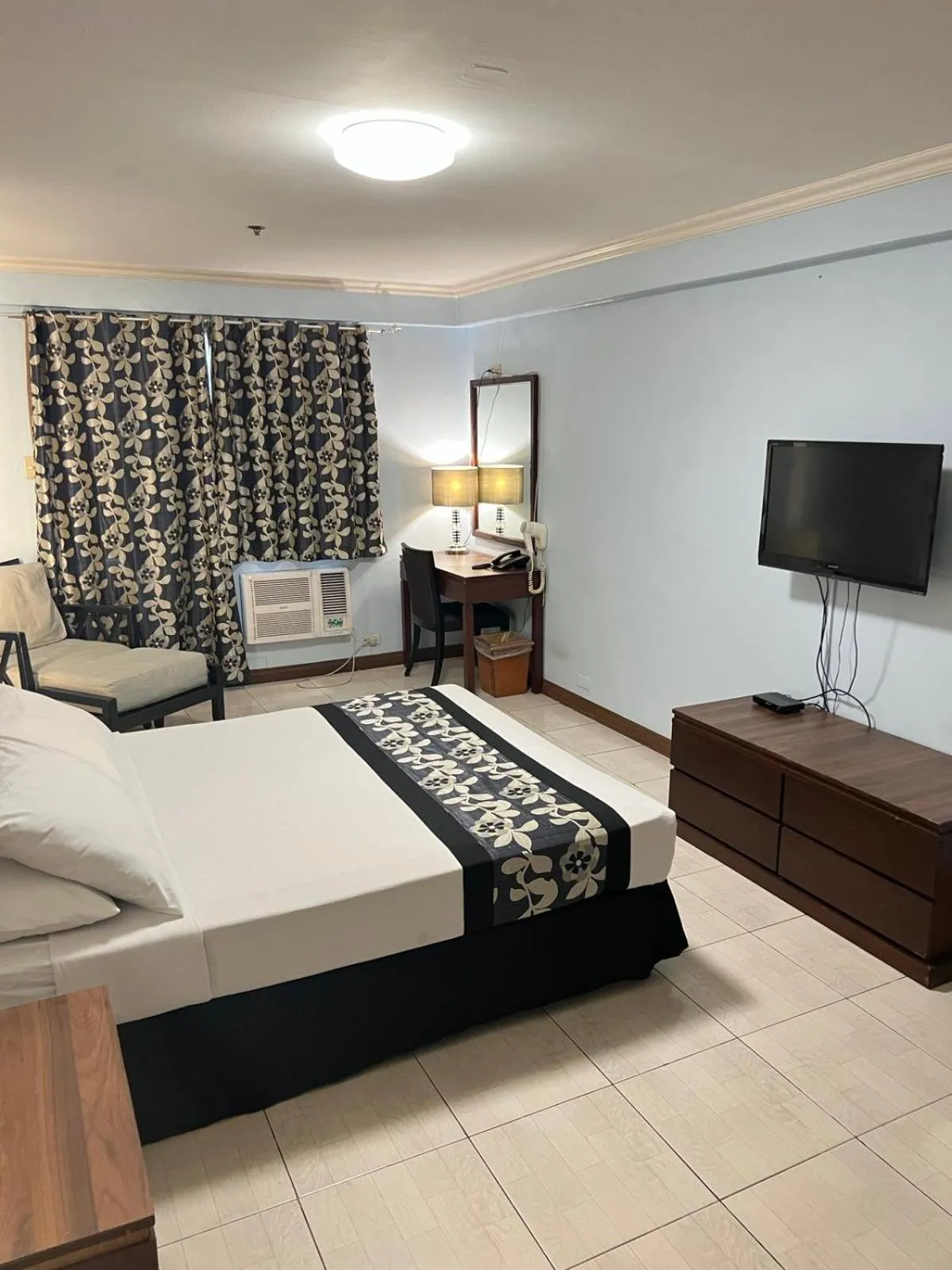 Bed in Jupiter Suites