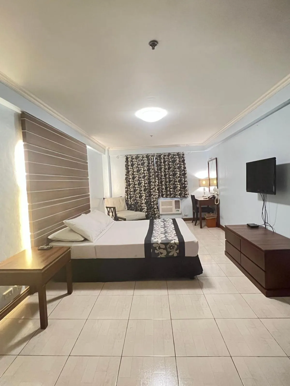 Bed in Jupiter Suites