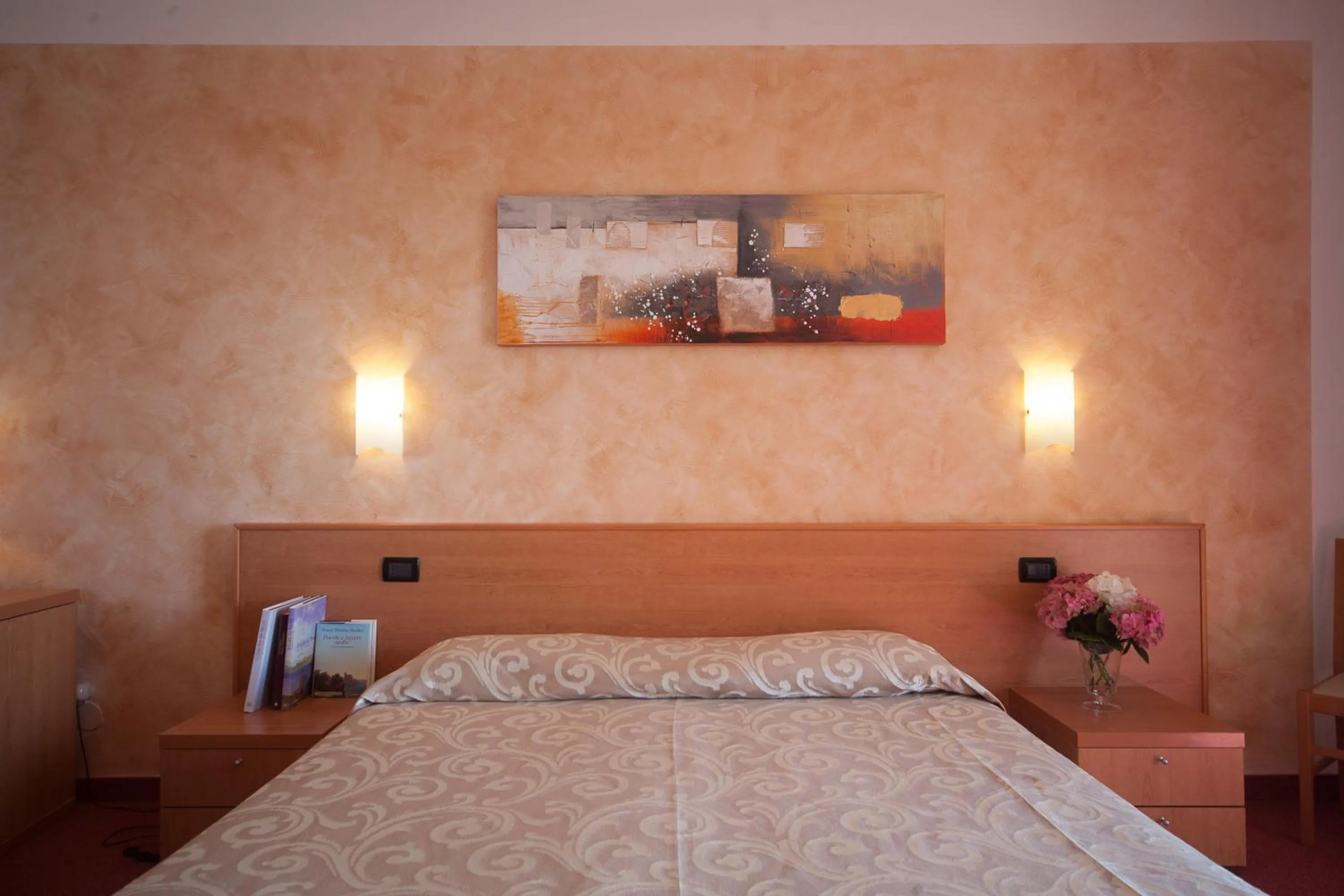 Bed in Albergo Suisse Bellevue