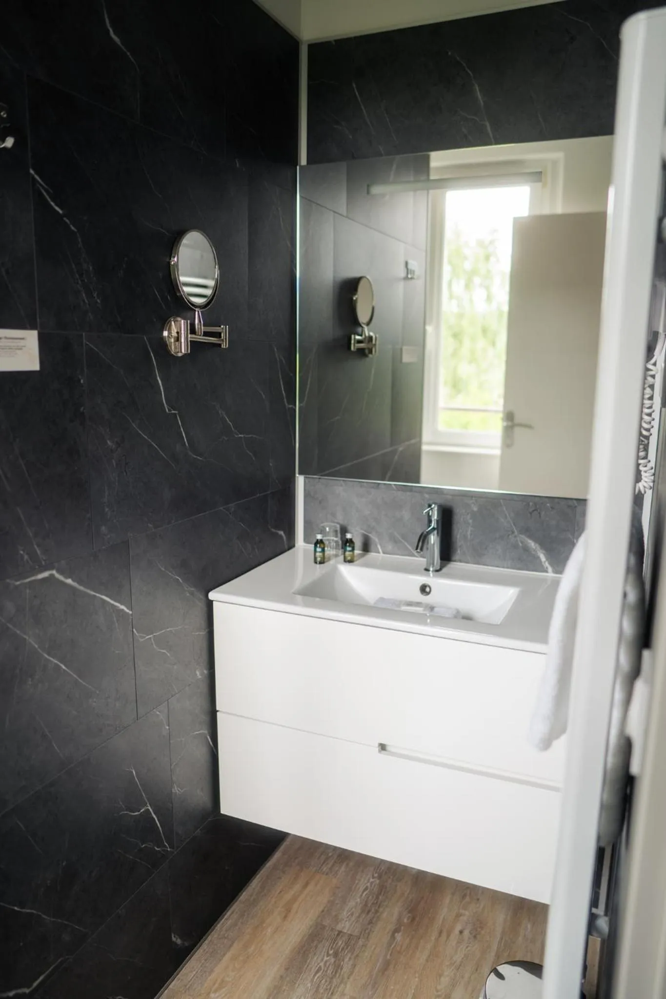 Bathroom in Logis Hotel Spa Restaurant Au Site Normand