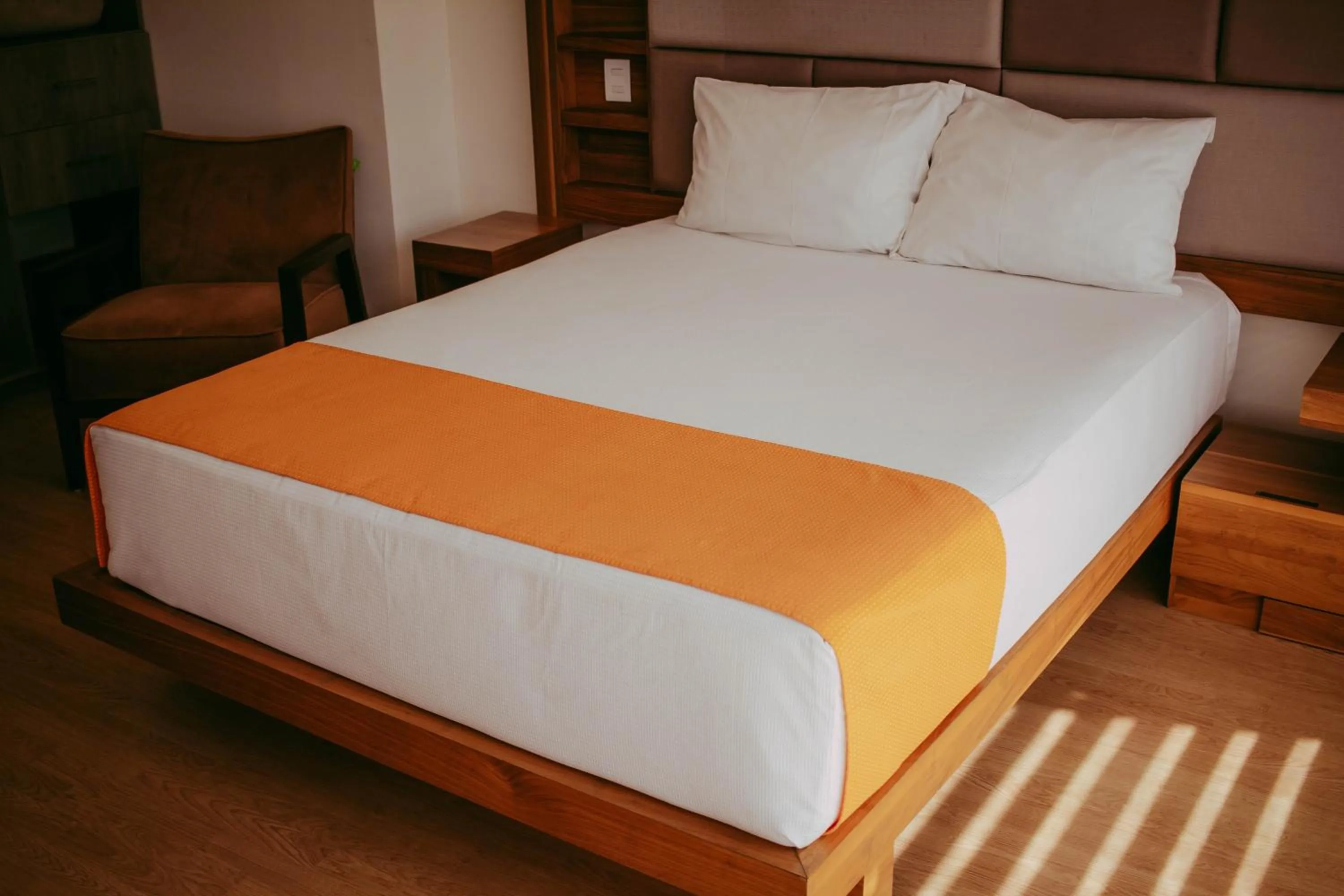 Bed in Millenium Plaza & Suites